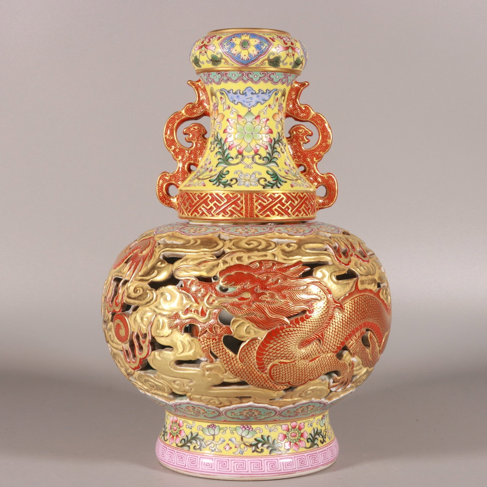 An Exquisite Enamel Gold Ground Auspicious Cloud and Dragon Pattern Dragon-Ears Vase: An Exquisite Enamel Gold Ground Auspicious Cloud and Dragon Pattern Dragon-Ears Vase,Qing Dynasty, China,Qianlong Four-character Mark,Size:10inx7.5in