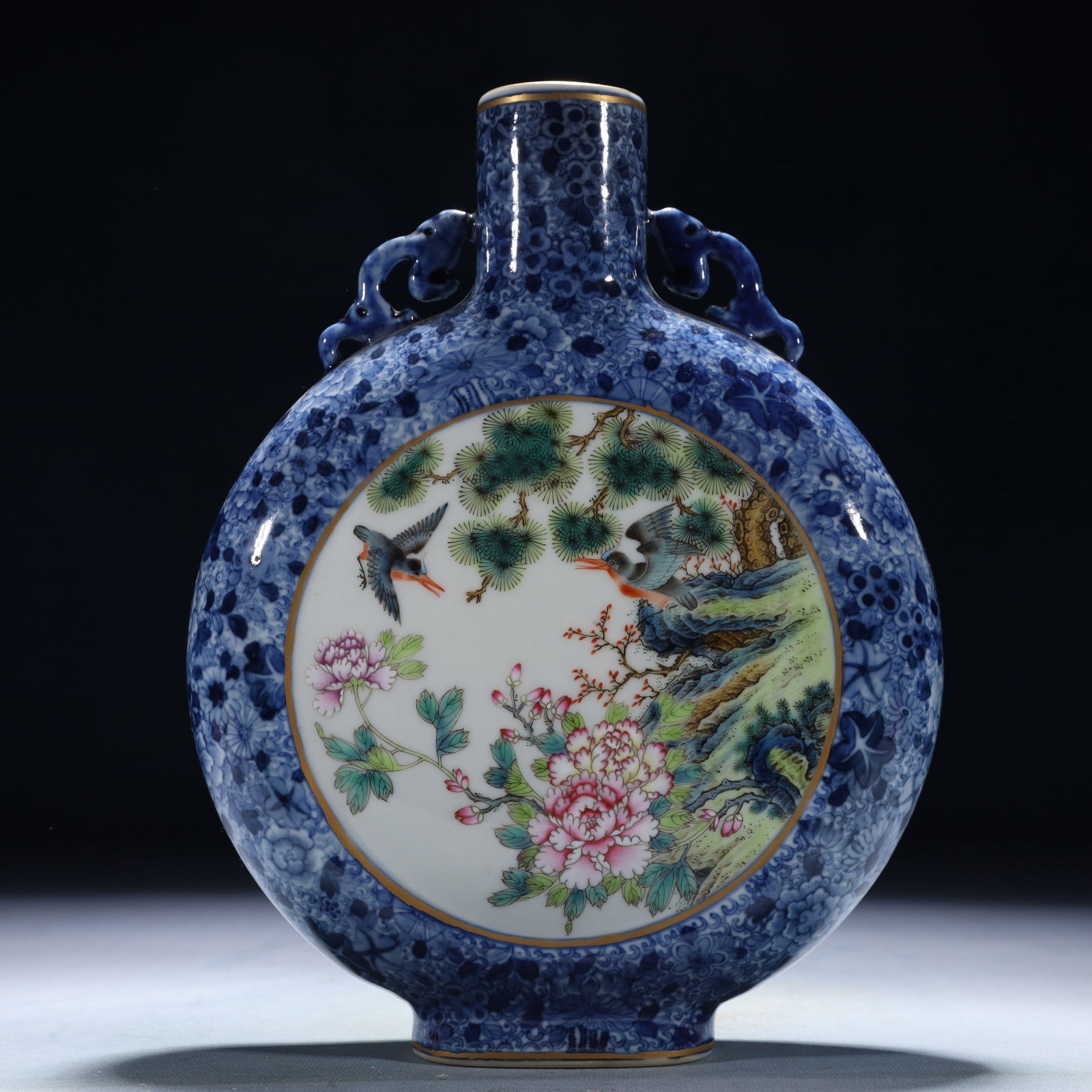 An Exquisite Blue and White Flower and Bird Pattern Double-Ears Vase: An Exquisite Blue and White Flower and Bird Pattern Double-Ears Vase,Qing Dynasty,China,Qianlong Six-character Mark,Size:7.1inx2inx9.4in,Weight:1200g 青花花鸟纹双&#
