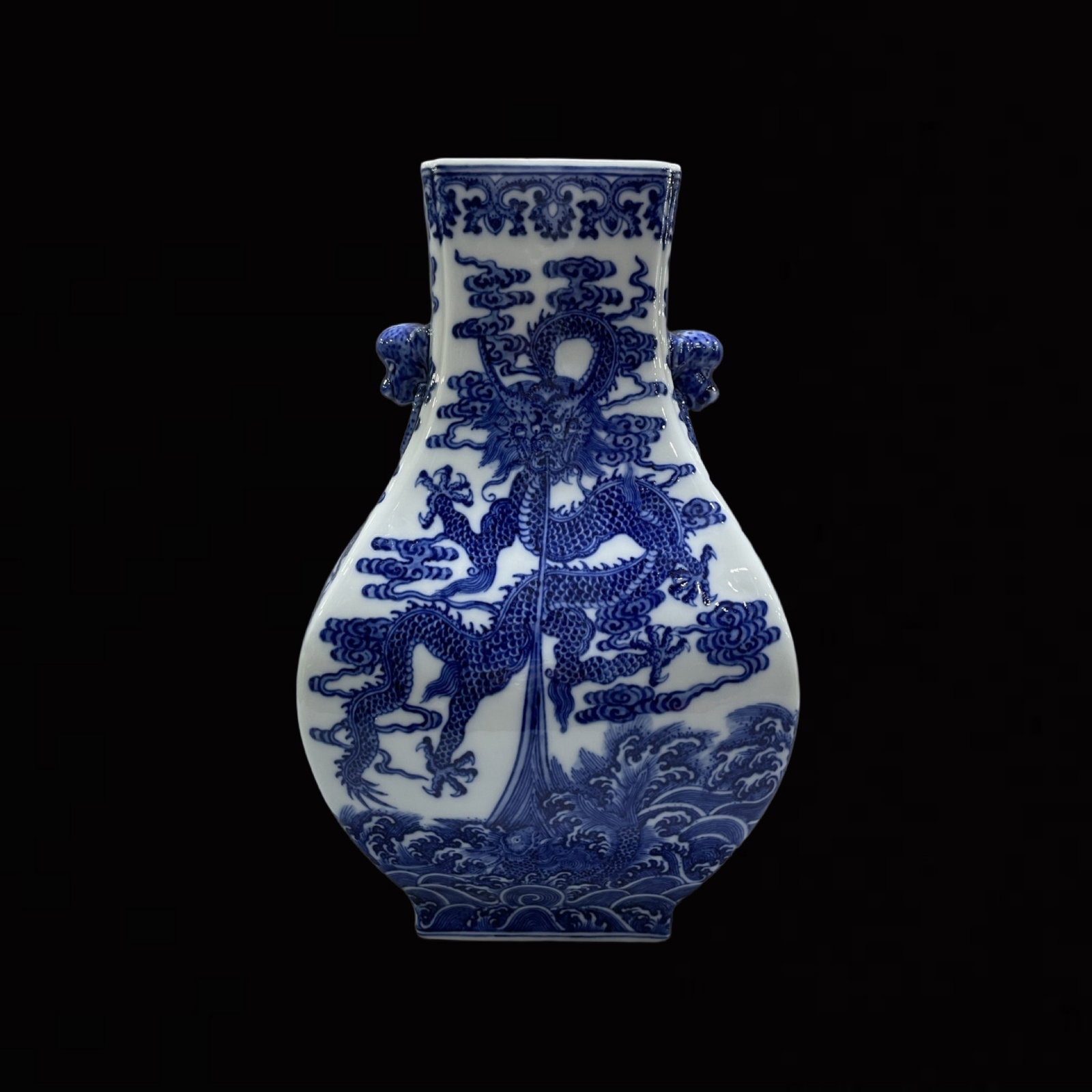A Rare Blue and White Seawater and Dragon Pattern Beast-Ears Vase: A Rare Blue and White Seawater and Dragon Pattern Beast-Ears Vase,Qing Dynasty,China,Qianlong Six-character Mark,Size:12.2inx7.9in 青花海水龙纹兽耳ī