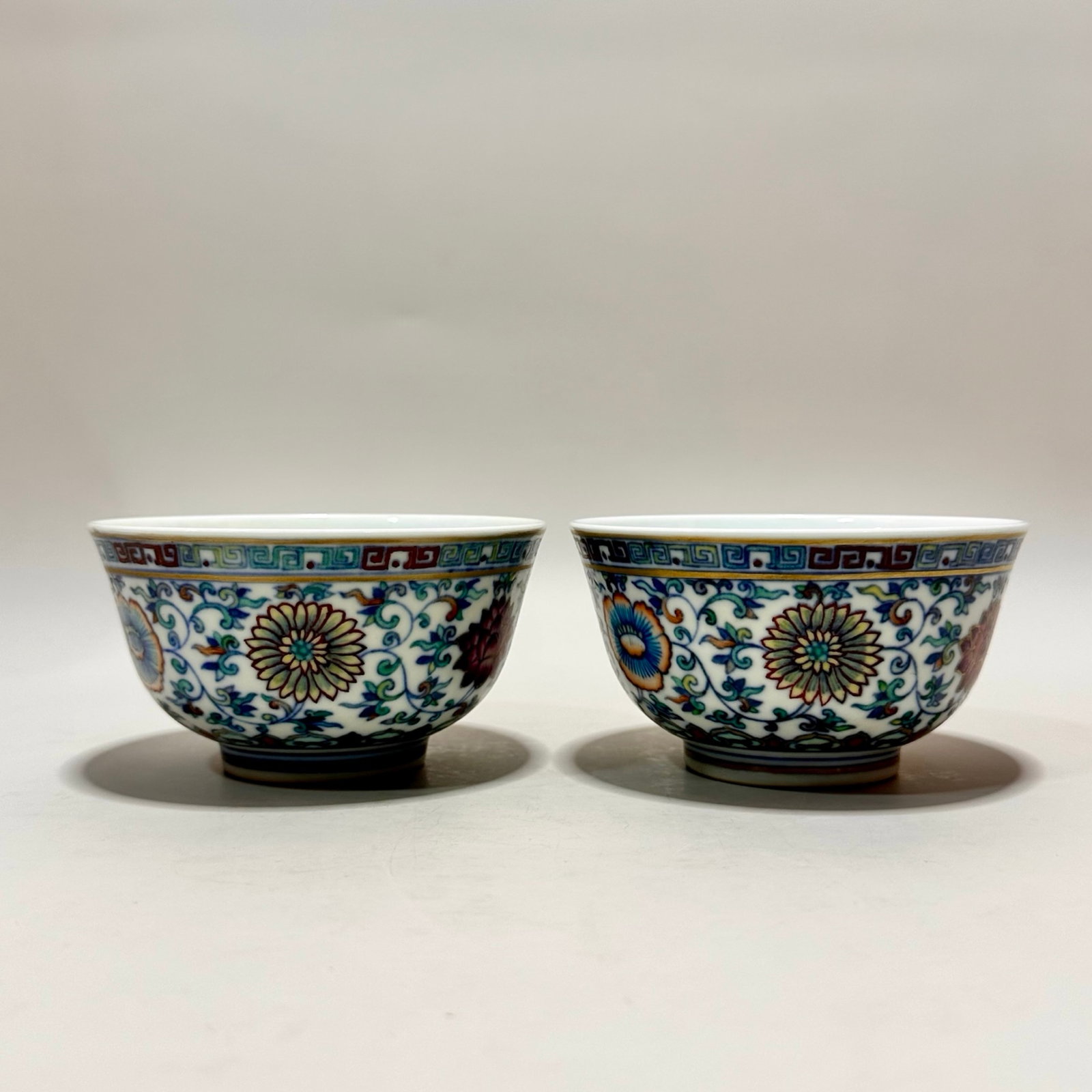 A Pair of Exquisite Blue and White Doucai Lotus Pattern Bowls: A Pair of Exquisite Blue and White Doucai Lotus Pattern Bowls,Qing Dynasty,China,Xianfeng Six-character Mark,Size:2.2inx4.1in 一对青花斗彩缠枝莲&#