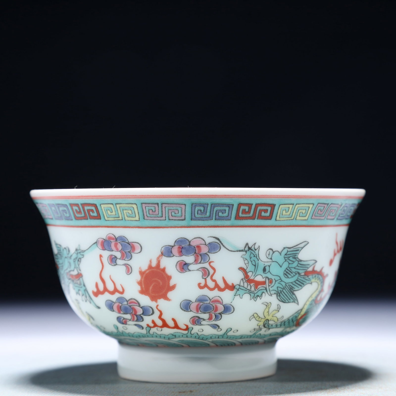 An Exquisite Famille-Rose Auspicious Cloud and Dragon Pattern Cup: An Exquisite Famille-Rose Auspicious Cloud and Dragon Pattern Cup,Qing Dynasty,China,Qianlong Four-character Mark,Size:4.3inx2.4in,Weight:150g 粉彩祥云龙纹杯&