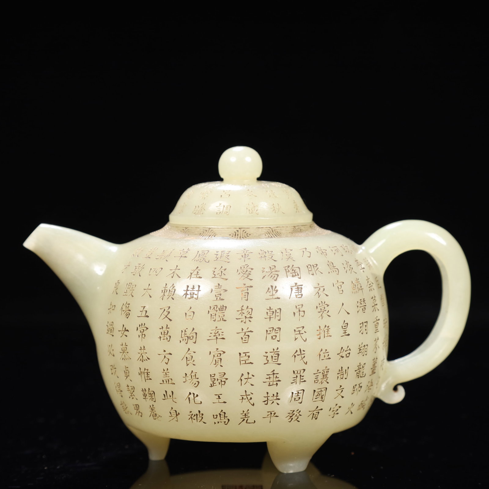 An Exquisite White Jade Poem Tripod Teapot: An Exquisite White Jade Poem Tripod Teapot,Qing Dynasty, China,Qianlong Four-character Mark,Size:5.9inx3.5inx4.3in,Weight:250g 白玉诗文三足茶壶,中