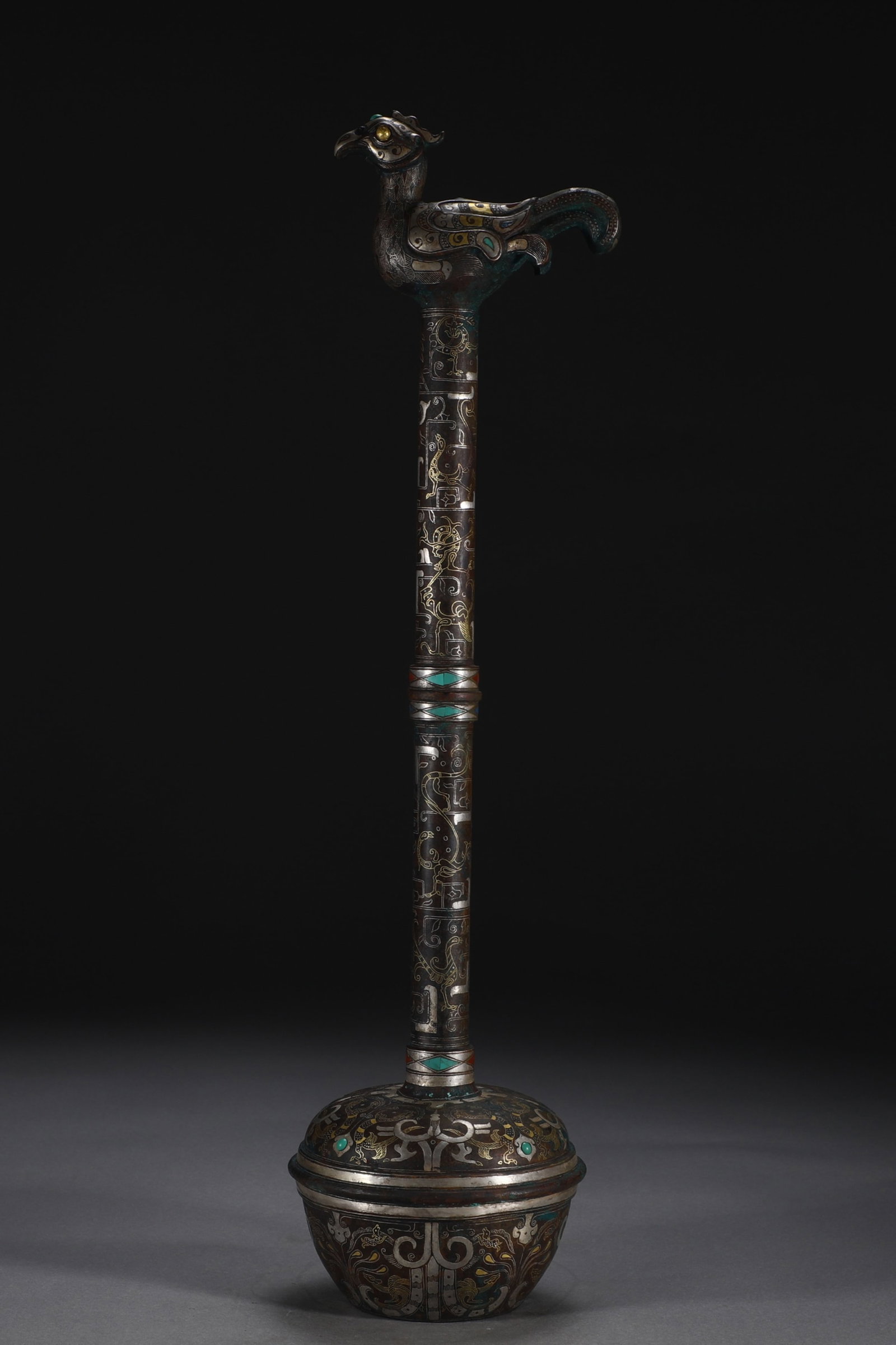 An Exquisite Bronze Inlaid Gold and Silver Phoenix Pattern Flagon,Inlaid Gems: An Exquisite Bronze Inlaid Gold and Silver Phoenix Pattern Flagon,Inlaid Gems,the Warring States period in China,Size:19.4inx4.9in,Weight:1450g 铜错金银凤纹酒