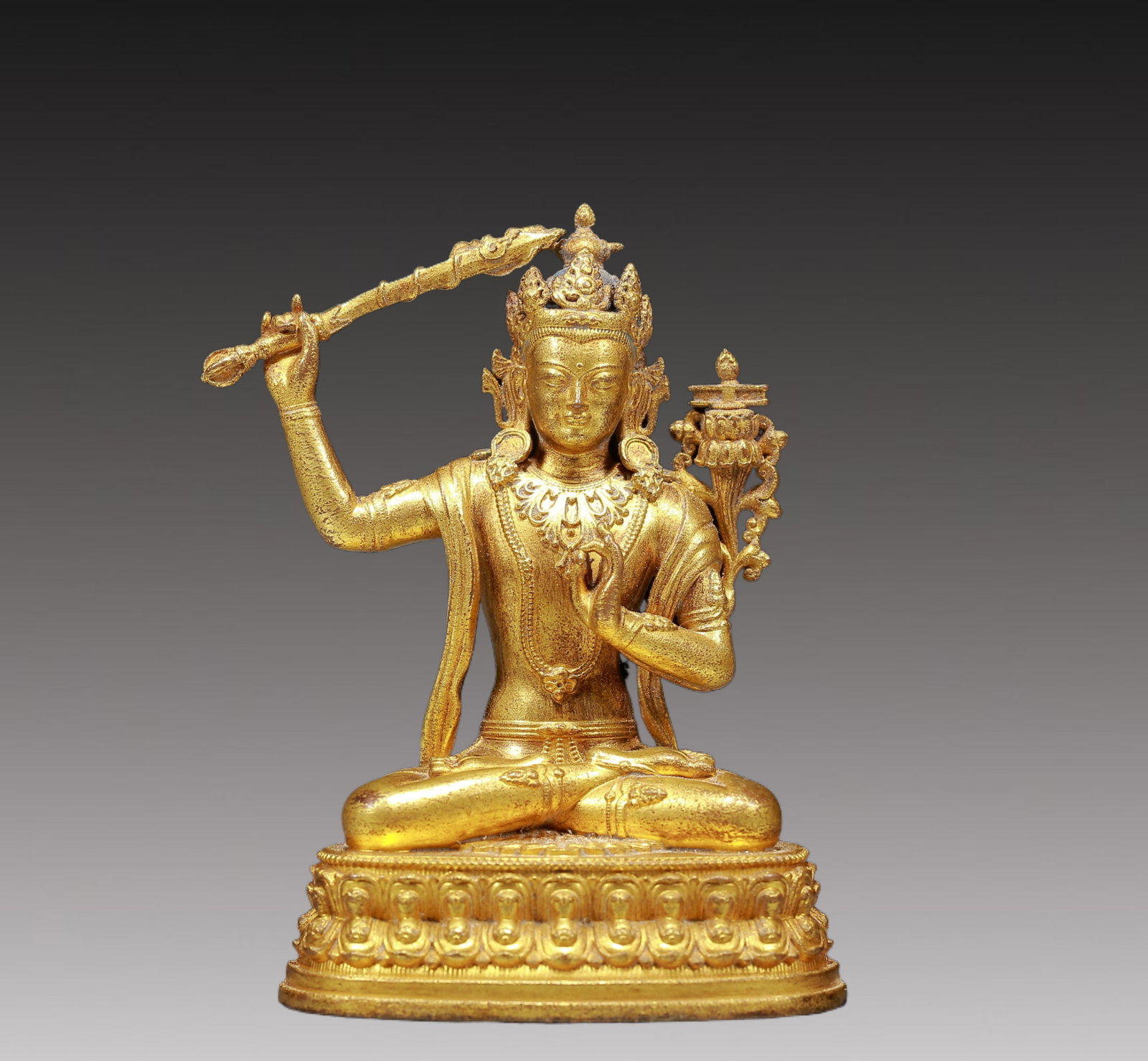 A Solemn Gilt Bronze Statue of Manjusri: A Solemn Gilt Bronze Statue of Manjusri,Ming Dynasty, China,Size:2.8inx2.2inx3.9in,Weight:300g 铜鎏金文殊菩萨像，明代