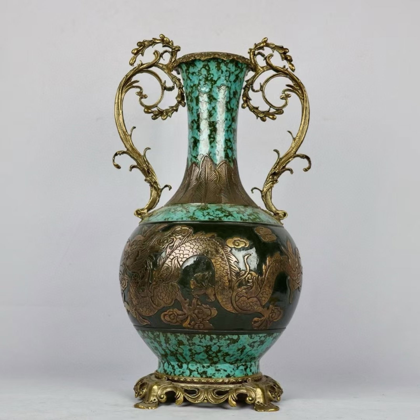 A Huge Ancient Bronze Color Inlaid Bronze Auspicious Cloud and Dragon Pattern Double-Ears Vase: A Huge Ancient Bronze Color Inlaid Bronze Auspicious Cloud and Dragon Pattern Double-Ears Vase,Qing Dynasty,China,Qianlong Six-character Mark,Size:18.9inx4.5inx10.6inx7.1in 古铜彩