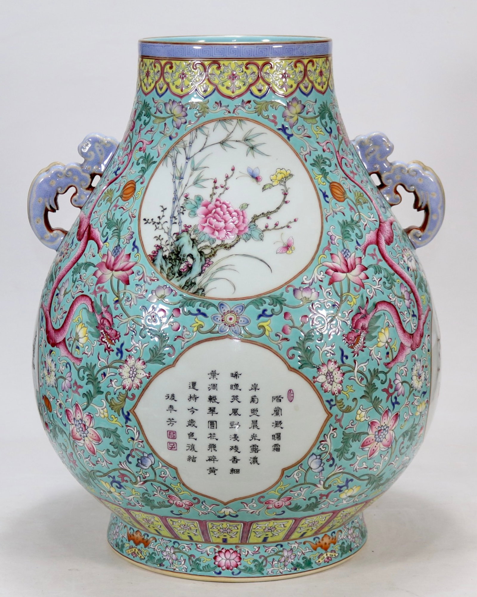 A Huge Famille-Rose Turquoise Glazed Flower and Dragon Pattern Double-Ears Vase,with poem: A Huge Famille-Rose Turquoise Glazed Flower and Dragon Pattern Double-Ears Vase,with poem,Qing Dynasty,China,Qianlong Six-character Mark,Size:18.3inx6.7in 粉彩松石绿ŵ