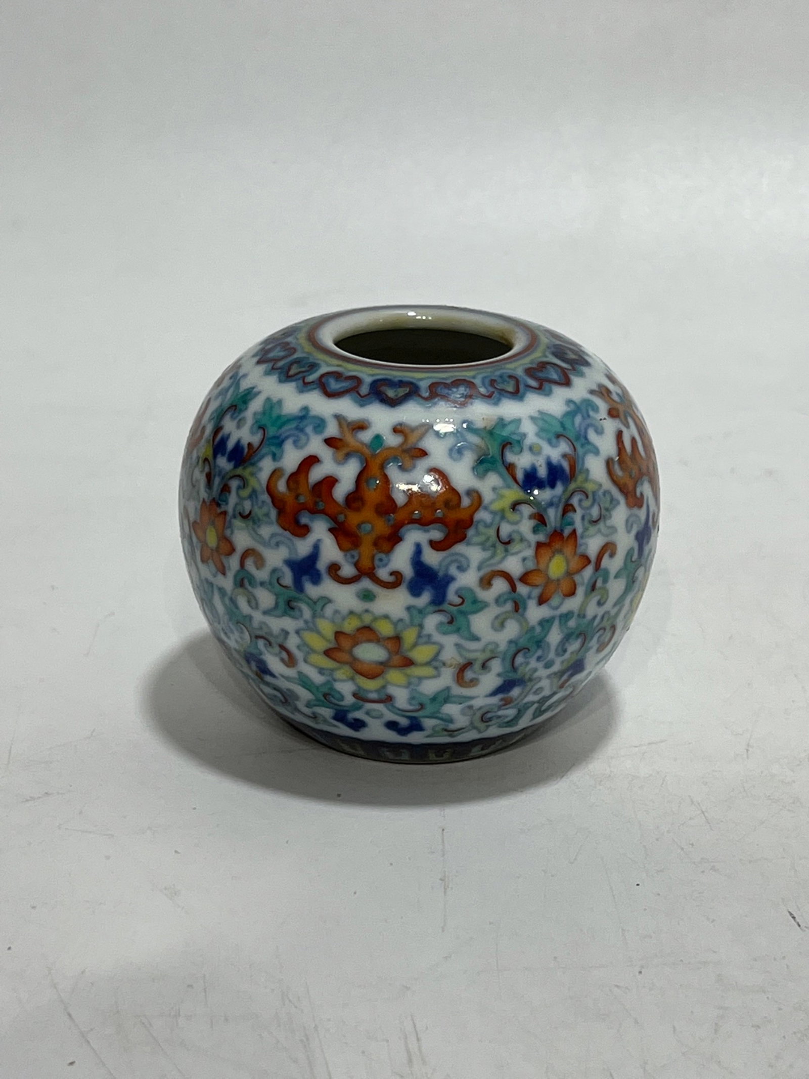 An Exquisite Doucai Lotus Pattern Water Pot: An Exquisite Doucai Lotus Pattern Water Pot,Qing Dynasty,China,Qianlong Six-character Mark,Size:2.6in