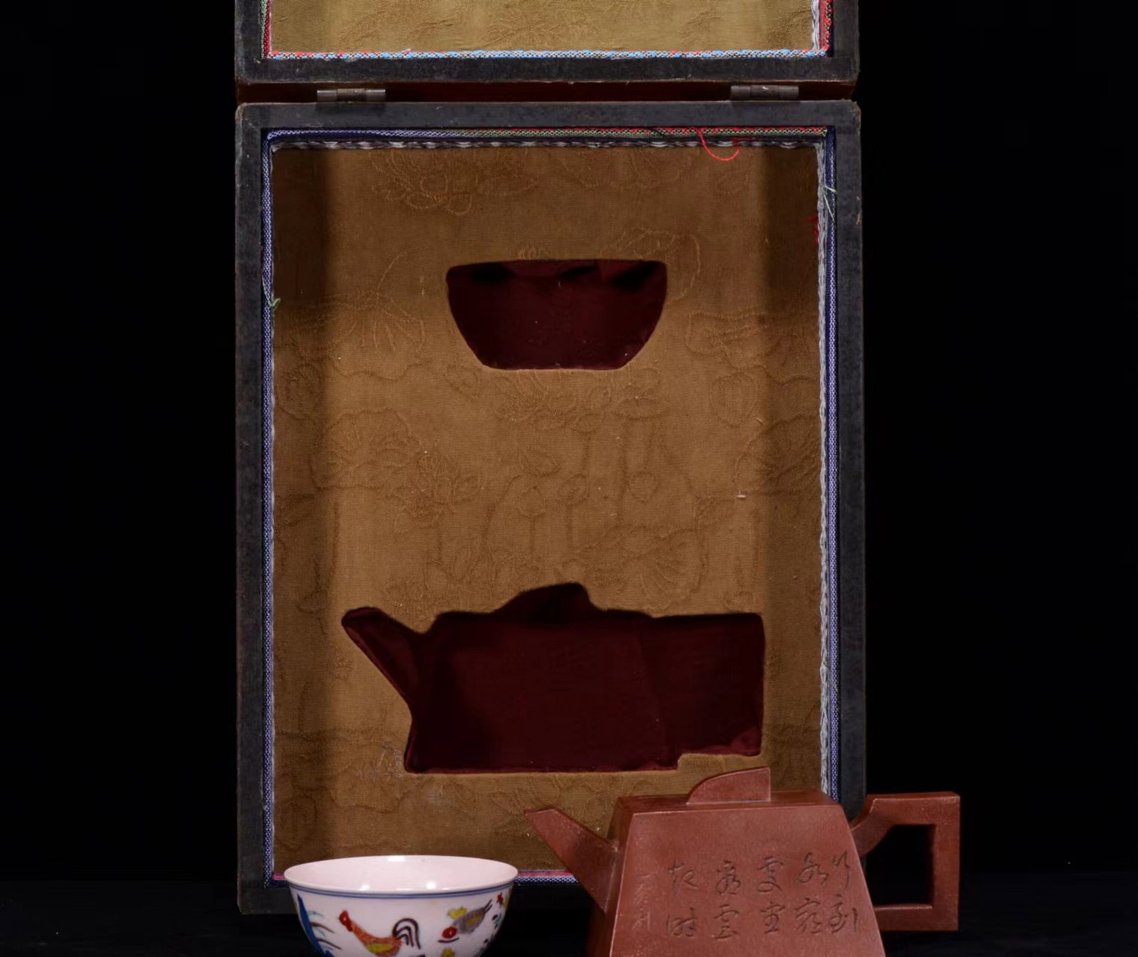 A Rare Purple Sands Pot,with Cup: A Rare Purple Sands Pot,with Cup,Ming Dynasty,China,Chenghua Six-character Mark,Size:(Box)15inx5.9inx5.5in,(Pot)4.3inx6.7in,(Cup)1.4inx3.3in 紫砂壶,带杯子,中&
