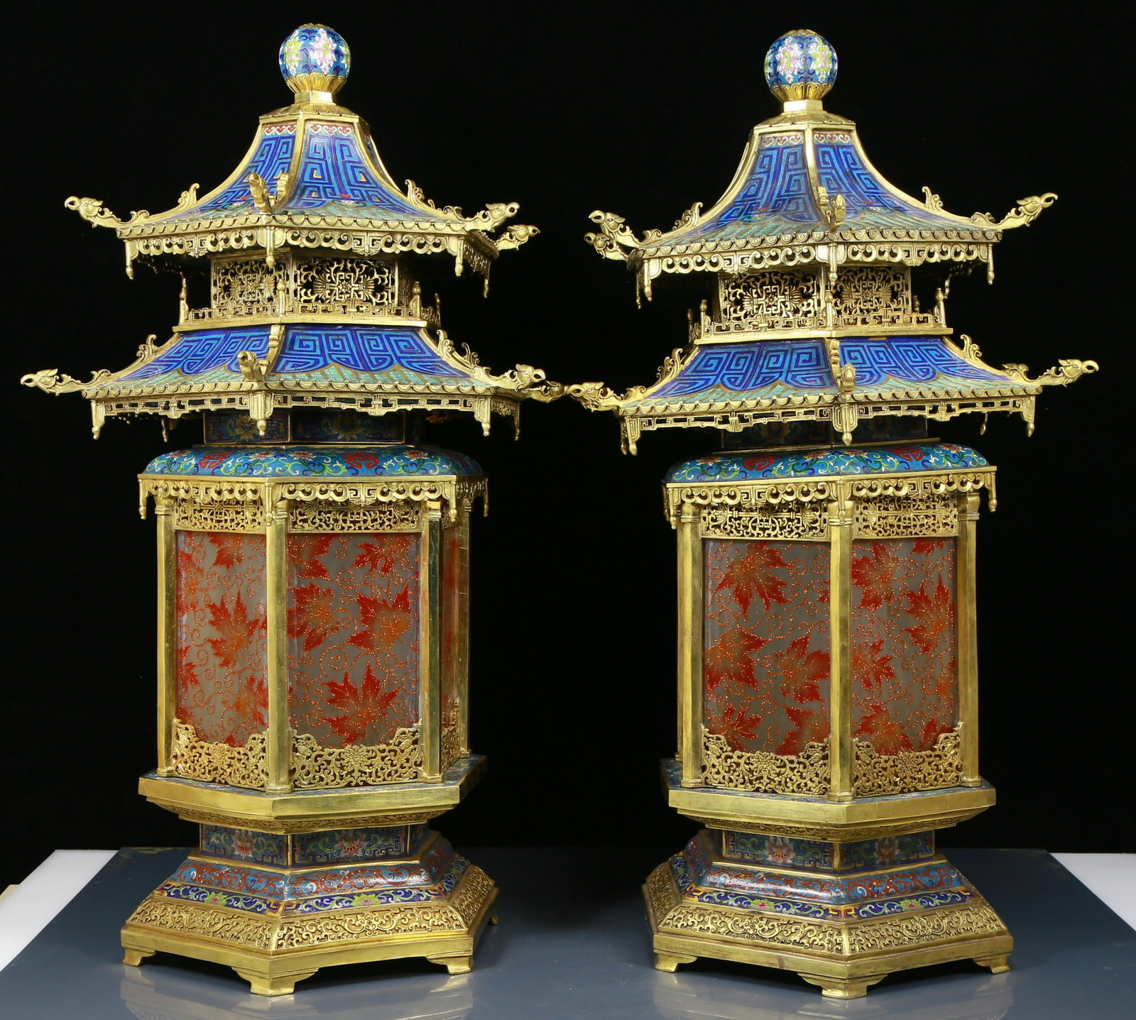 A perfect pair of cloisonne lotus pattern palace lanterns: A pair of perfect cloisonné palace lanterns with lotus pattern, from the Qing Dynasty in China. Each palace lantern is carefully crafted and covered with magnificent cloisonné craftsmanship,