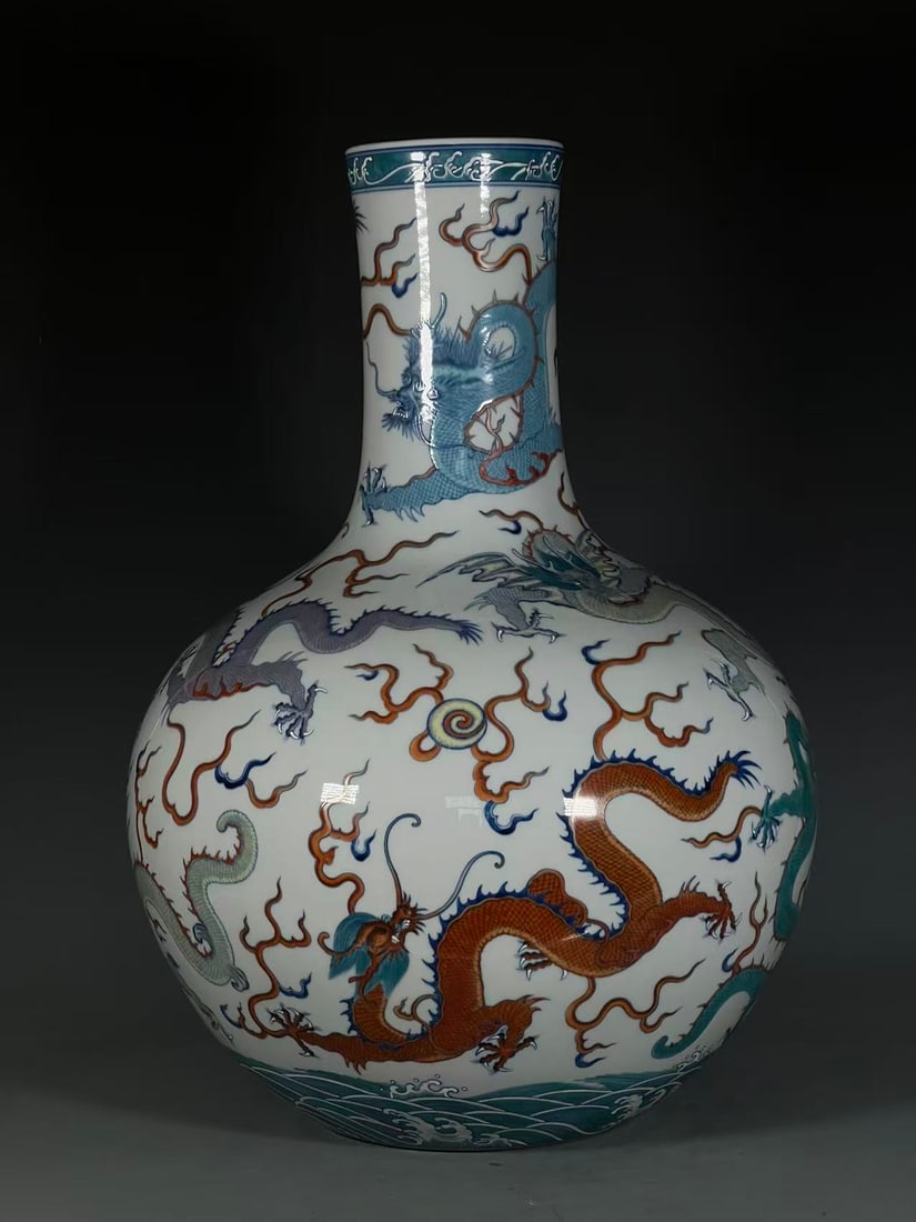 A Huge Doucai Seawater and Dragon Pattern Vase: A Huge Doucai Seawater and Dragon Pattern Vase,Qing Dynasty,China,Qianlong Six-character Mark,Size:21.8inx4.8inx7.3in