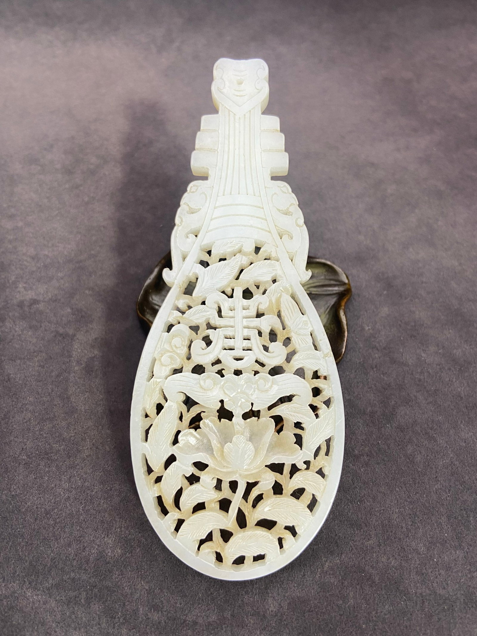 An Exquisite White Jade Hollow Lotus Shou-Character Pattern Pendant: An Exquisite White Jade Hollow Lotus Shou-Character Pattern Pendant,Qing Dynasty,China,Size:5inx1.9inx0.2in,Weight:54g 白玉镂空莲花寿字纹挂&