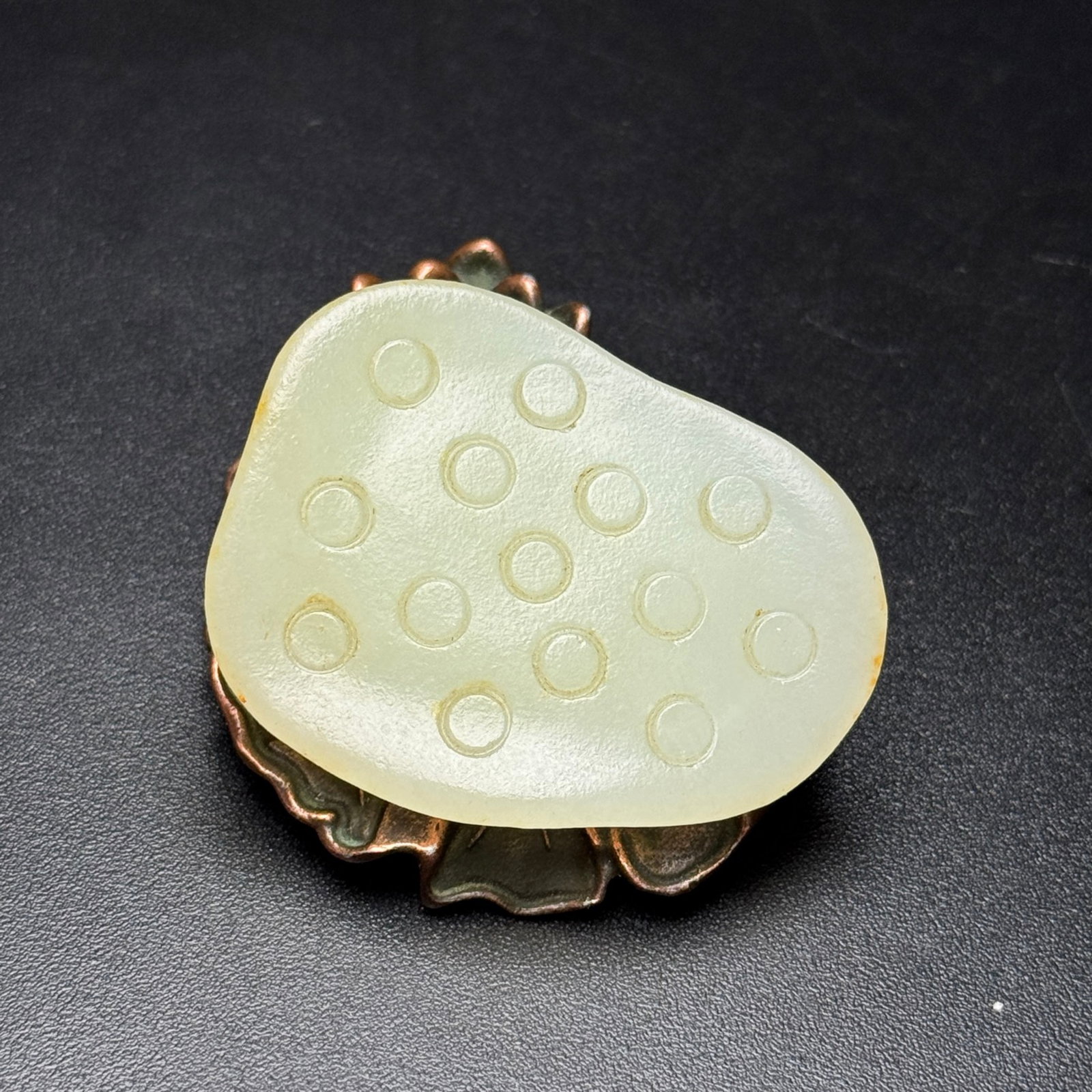 An Exquisite White Jade Lotus Pod Pendant: An Exquisite White Jade Lotus Pod Pendant,Qing Dynasty,China,Size:1.5inx1.9inx0.8in,Weight:44g 白玉莲蓬挂件,中国清代
