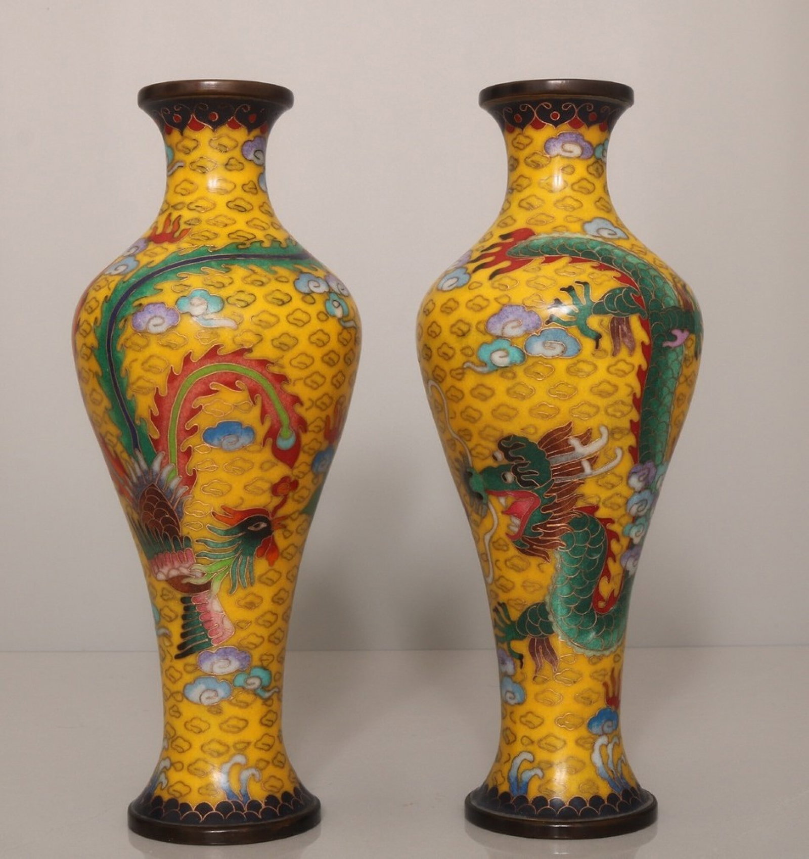 A Pair of Exquisite Cloisonne Dragon and Phoenix Pattern Vases: A Pair of Exquisite Cloisonne Dragon and Phoenix Pattern Vases,Qing Dynasty,China,Qianlong Four-Character Mark,Size:9.8inx3.9in*2,Weight:2540g 一对景泰蓝龙凤&