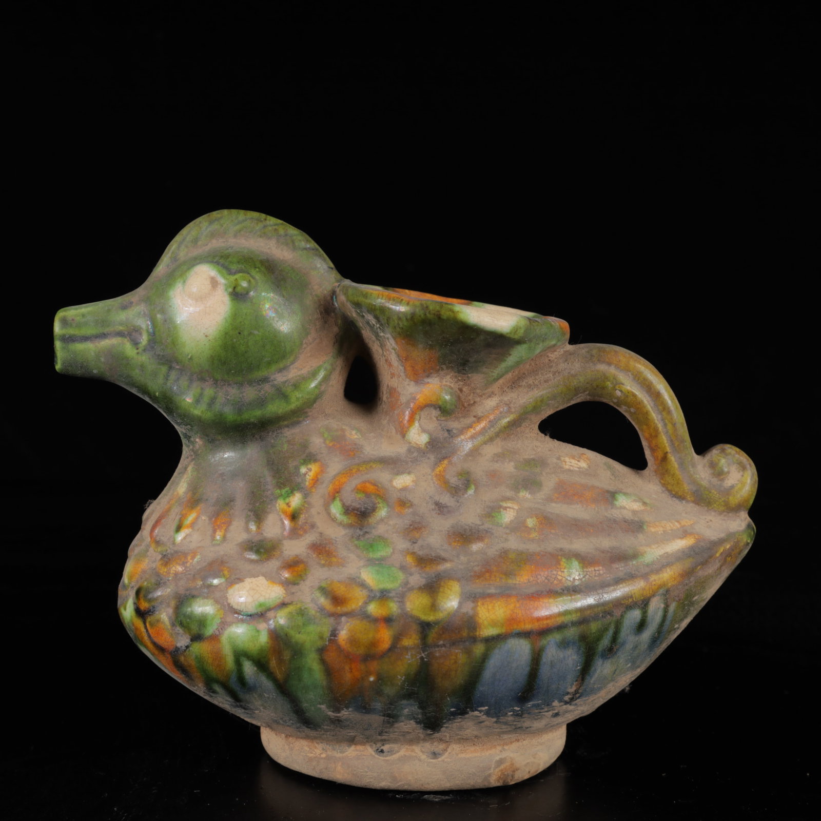 An Exquisite Tang Tri-Color Glazed Pottery duck Ornament: An Exquisite Tang Tri-Color Glazed Pottery duck Ornament,Tang Dynasty,China,Size:5.5inx7.1inx4.7in,Weight:450g 唐三彩鸭摆件,中国唐代