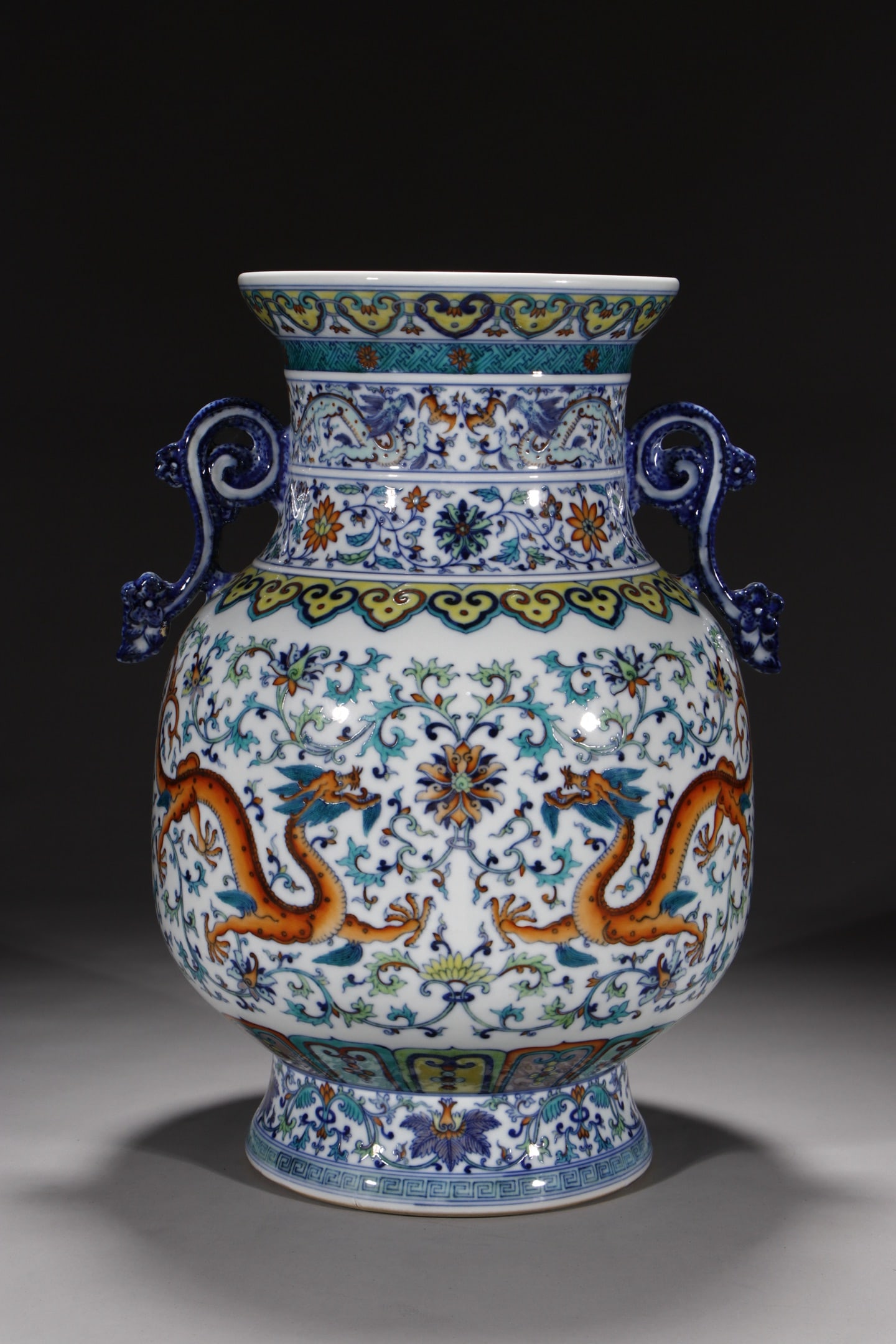 A Rare Doucai Lotus and Dragon Pattern Double-Ears Vase: A Rare Doucai Lotus and Dragon Pattern Double-Ears Vase,Qing Dynasty,China,Qianlong Six-character Mark,Size:15.4in 斗彩缠枝莲龙纹双耳瓶,