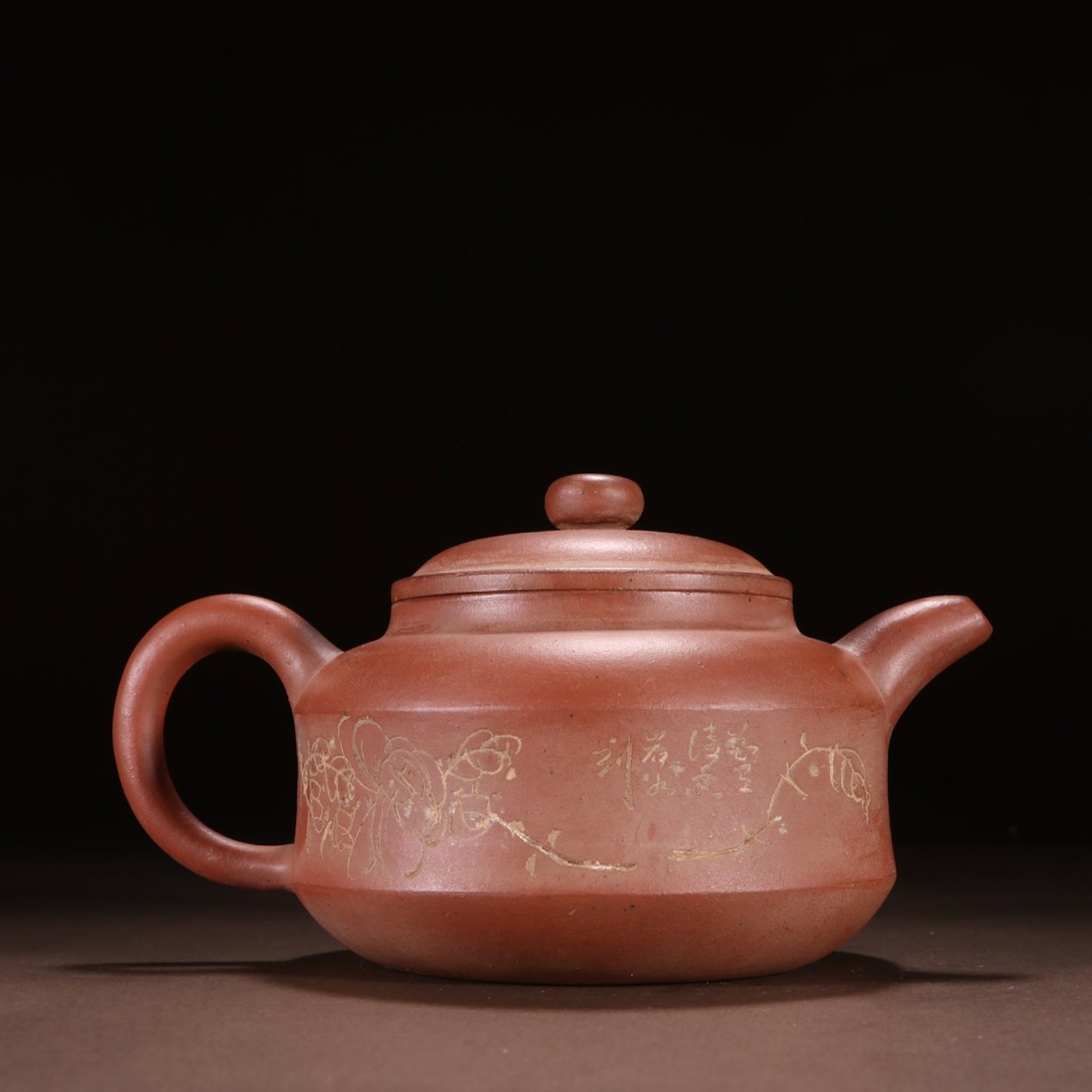 A Rare Purple Sands Flower Pattern Teapot,with poem: A Rare Purple Sands Flower Pattern Teapot,with poem,the Republic of China,Fanzhuang Nongjia Mark,Size:3.9inx7.1in,Weight:330g 紫砂花卉纹茶壶,带诗&
