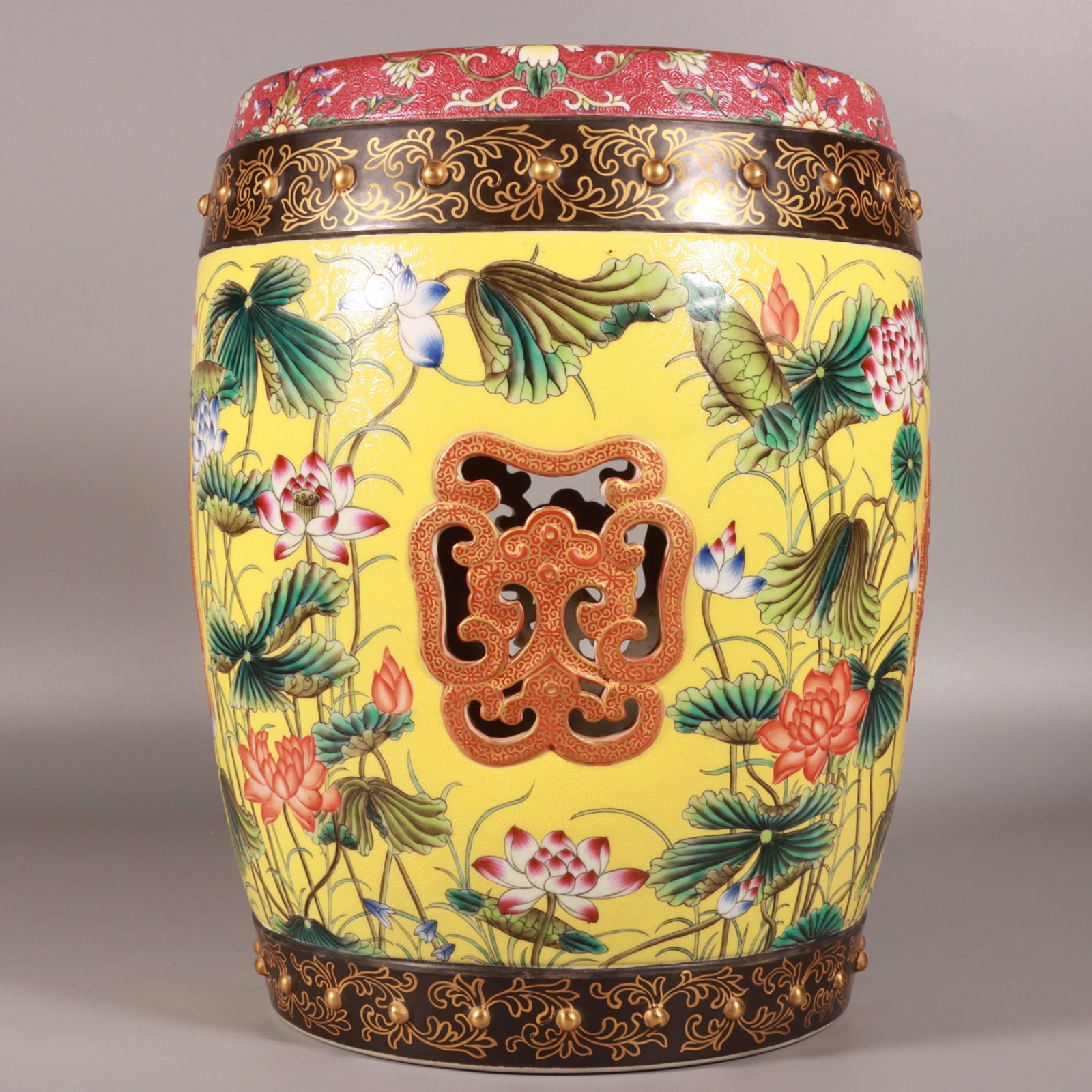 A Rare Yellow Ground Famille-Rose Lotus Pattern Stool: A Rare Yellow Ground Famille-Rose Lotus Pattern Stool,Qing Dynasty,China,Qianlong Four-character Mark,Size:11.8inx9.4in 黄地粉彩荷花纹凳子,中