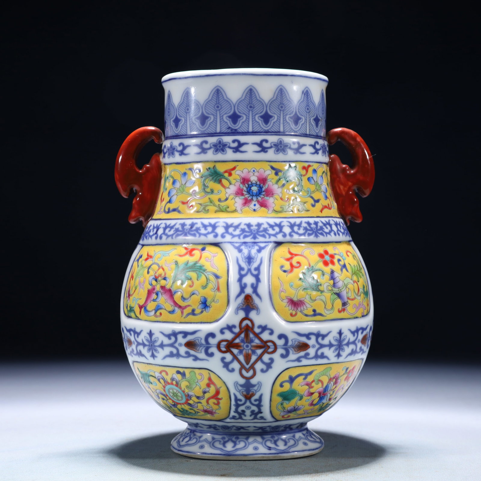 An Exquisite Blue and White Famille-Rose Lotus Pattern Double-Ears Vase: An Exquisite Blue and White Famille-Rose Lotus Pattern Double-Ears Vase,Qing Dynasty,China,Yongzheng Six-character Mark,Size:5.5inx3.9inx7.9in,Weight:850g 青花粉彩缠ĉ