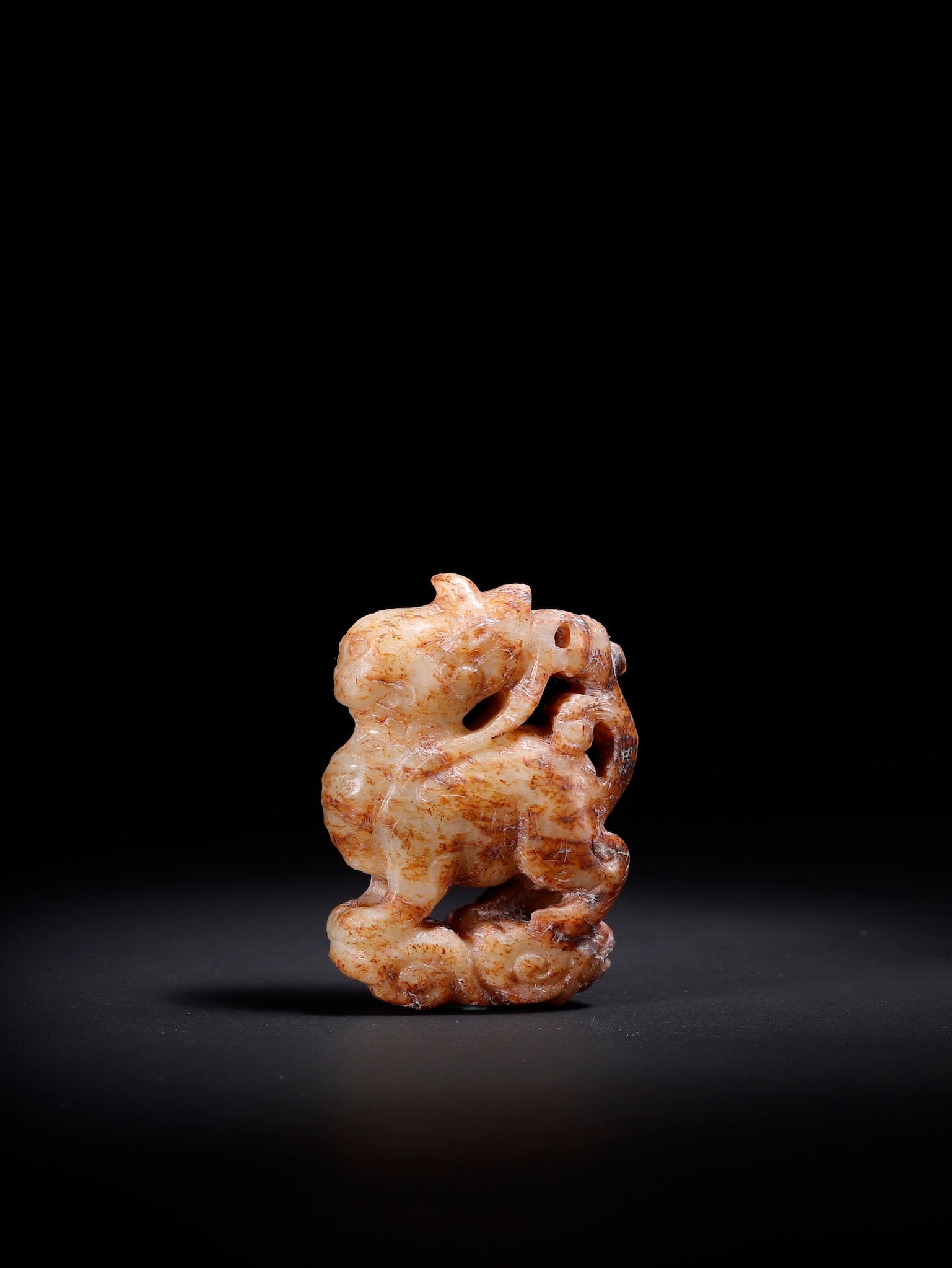 An Exquisite White Jade Auspicious Beast Pendant: An Exquisite White Jade Auspicious Beast Pendant,Qing Dynasty,China,Size:1.5inx0.6inx2in,Weight:39.3g