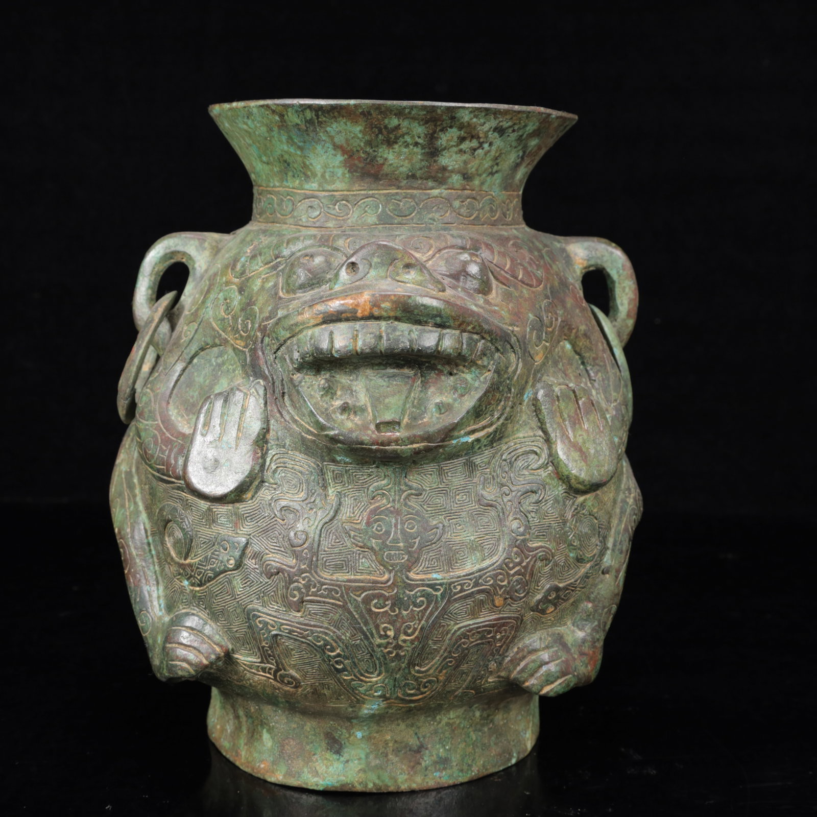 An Archaic Bronze Beast-Face Pattern Double-Ears Jar: An Archaic Bronze Beast-Face Pattern Double-Ears Jar,The Warring States period in China,Size:7.1inx5.9inx8.7in,Weight:2500g 青铜兽面纹双耳罐,中