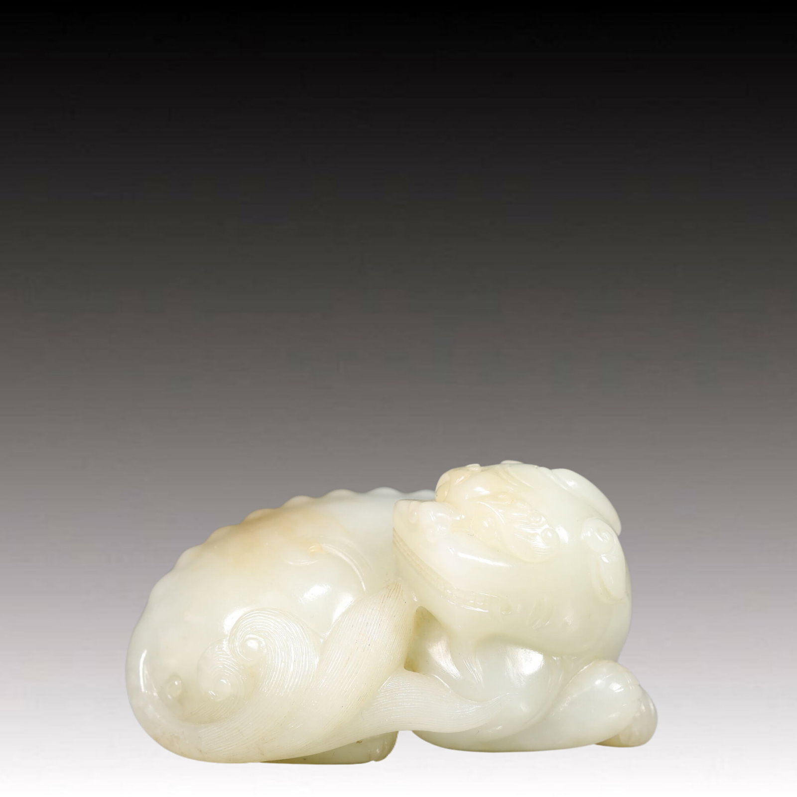An Exquisite White Jade Unicorn Ornament: An Exquisite White Jade Unicorn Ornament, Qing Dynasty, China,Size:3.1inx2inx1.6in,Weight:250g 白玉独角兽摆件, 中国清代