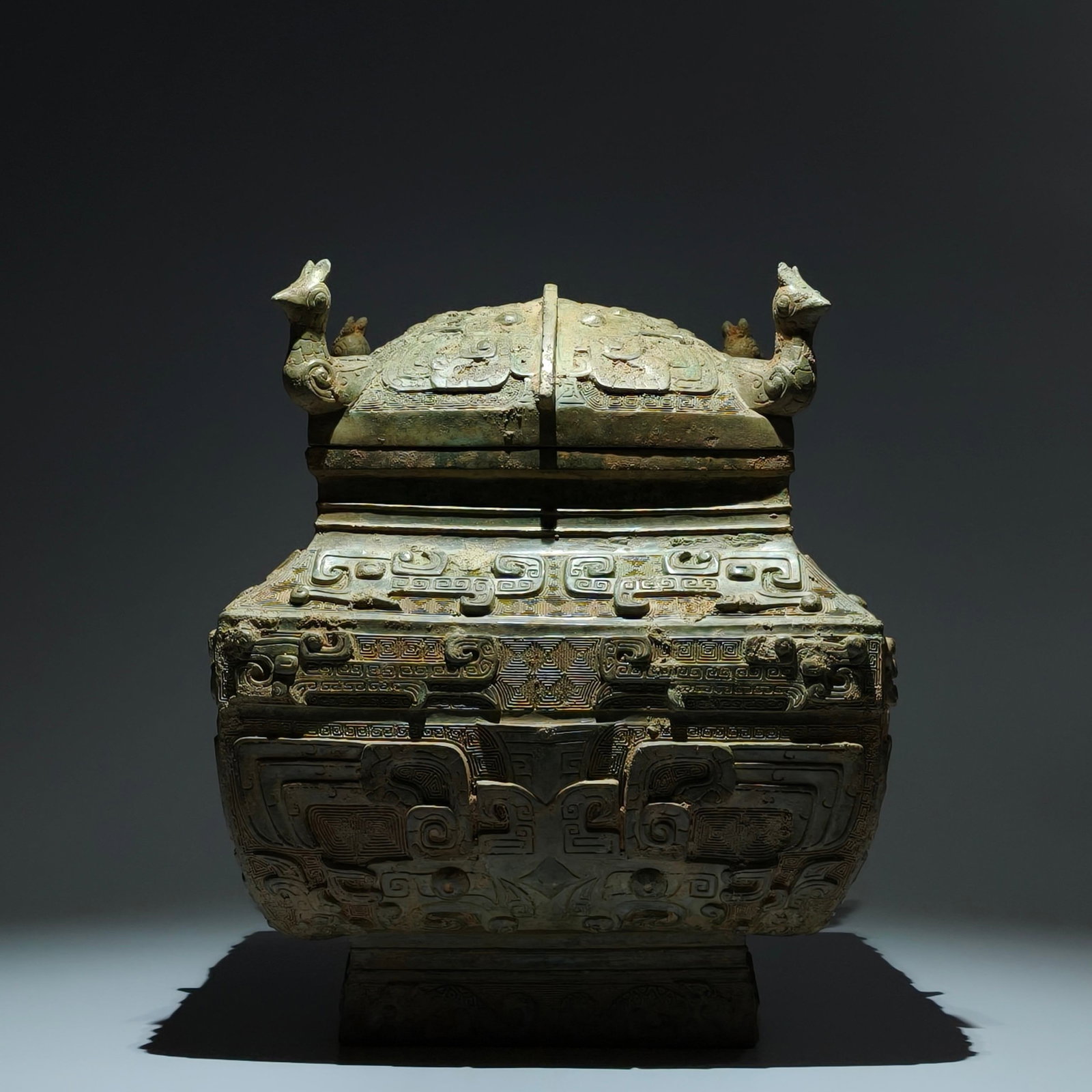 An Archaic Bronze Beast-Face Pattern ritual vessel: An Archaic Bronze Beast-Face Pattern ritual vessel,Shang Dynasty,China,Size:15.4inx12.6in 青铜兽面纹礼器,中国商代