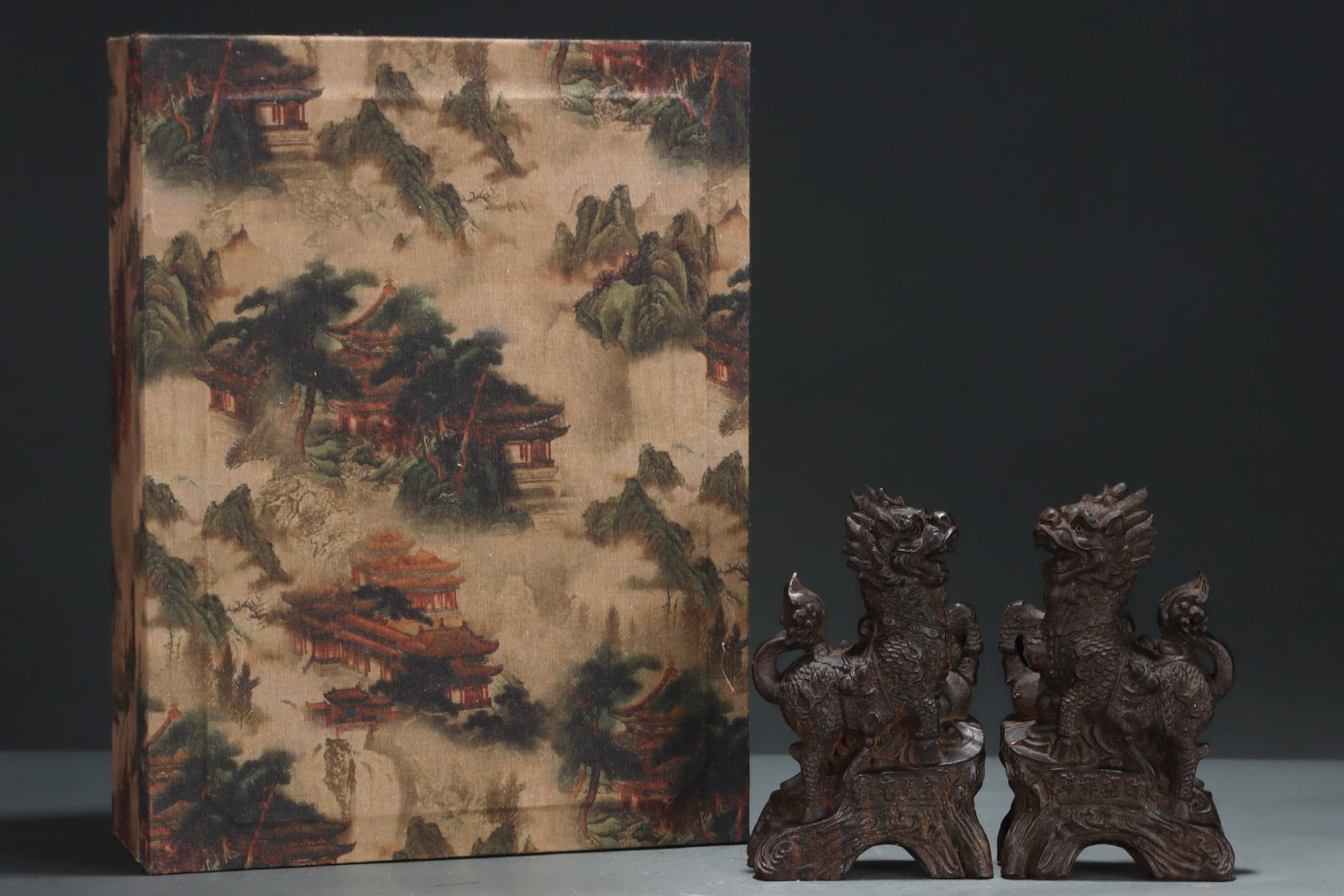 A Pair of Rare Eaglewood Kylin Pattern Ornaments: A Pair of Rare Eaglewood Kylin Pattern Ornaments,Qing Dynasty, China,Qianlong Six-Character Mark,Size:4.5inx2inx7.3in 一对沉香麒麟摆件,中国&