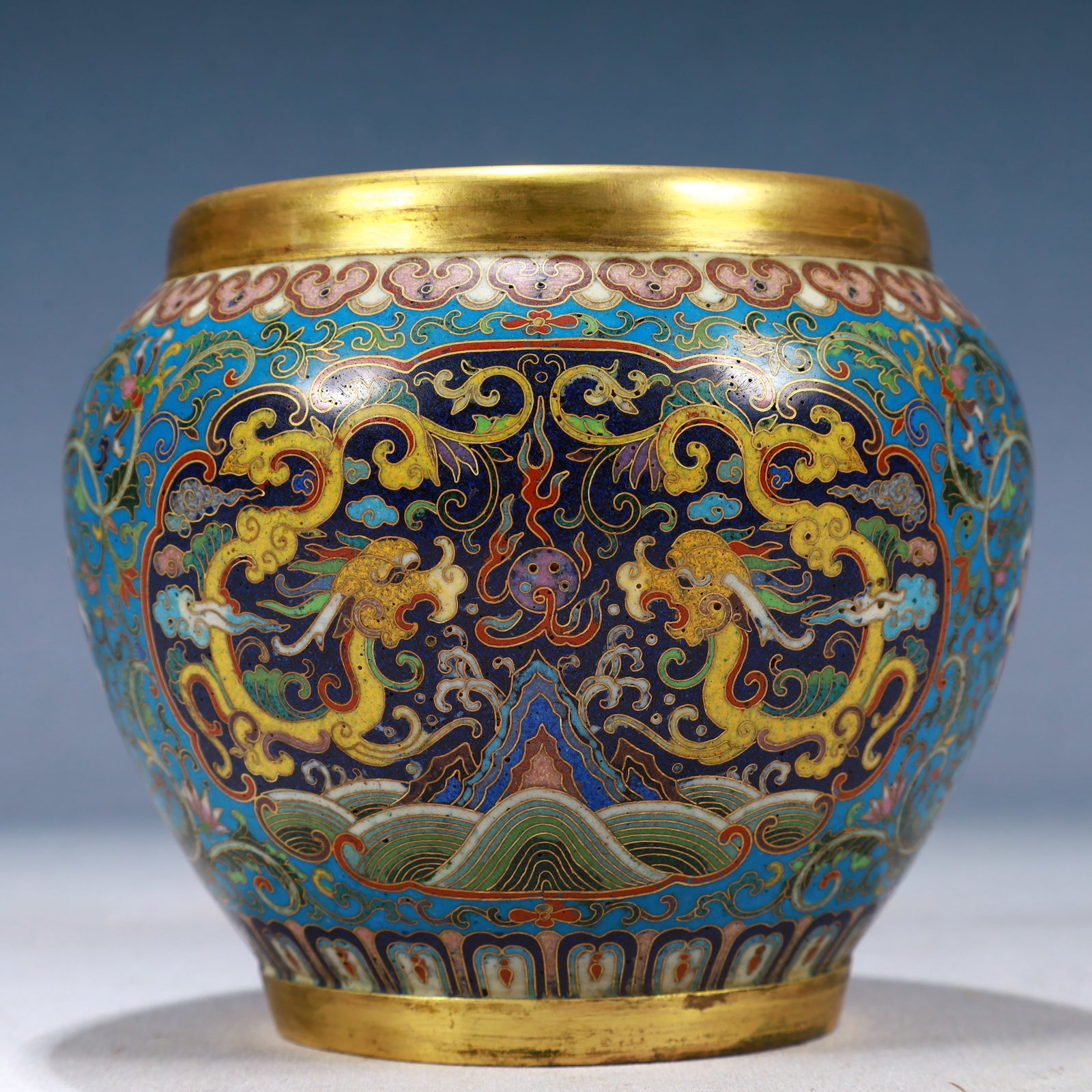 An Exquisite Cloisonne Lotus and Dragon Pattern Jar: An Exquisite Cloisonne Lotus and Dragon Pattern Jar,Qing Dynasty, China,Size:5.9inx5.1in,Weight:850g 景泰蓝缠枝莲龙纹罐,中国清&#