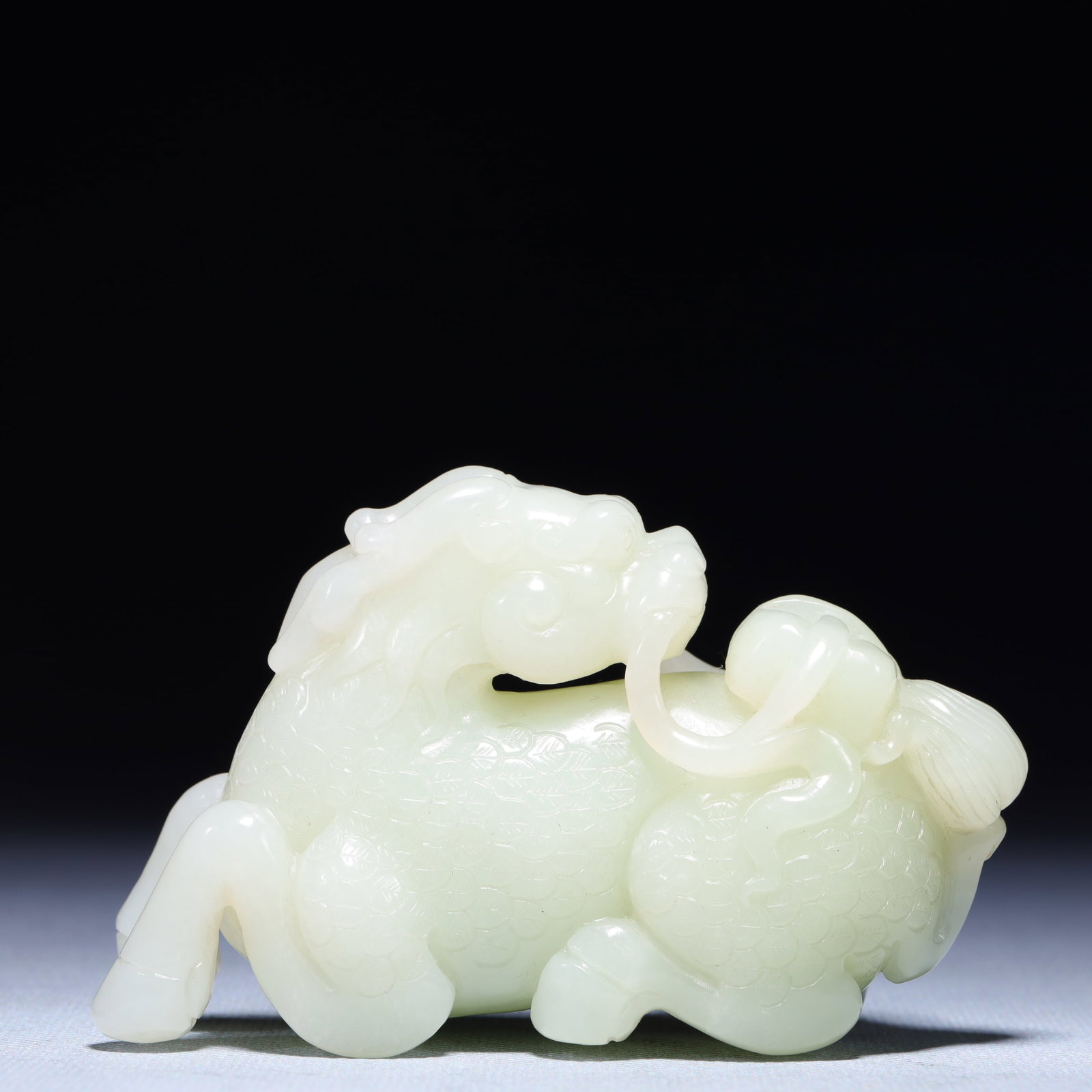 An Exquisite White Jade Auspicious Beast Ornament (1 of 11)