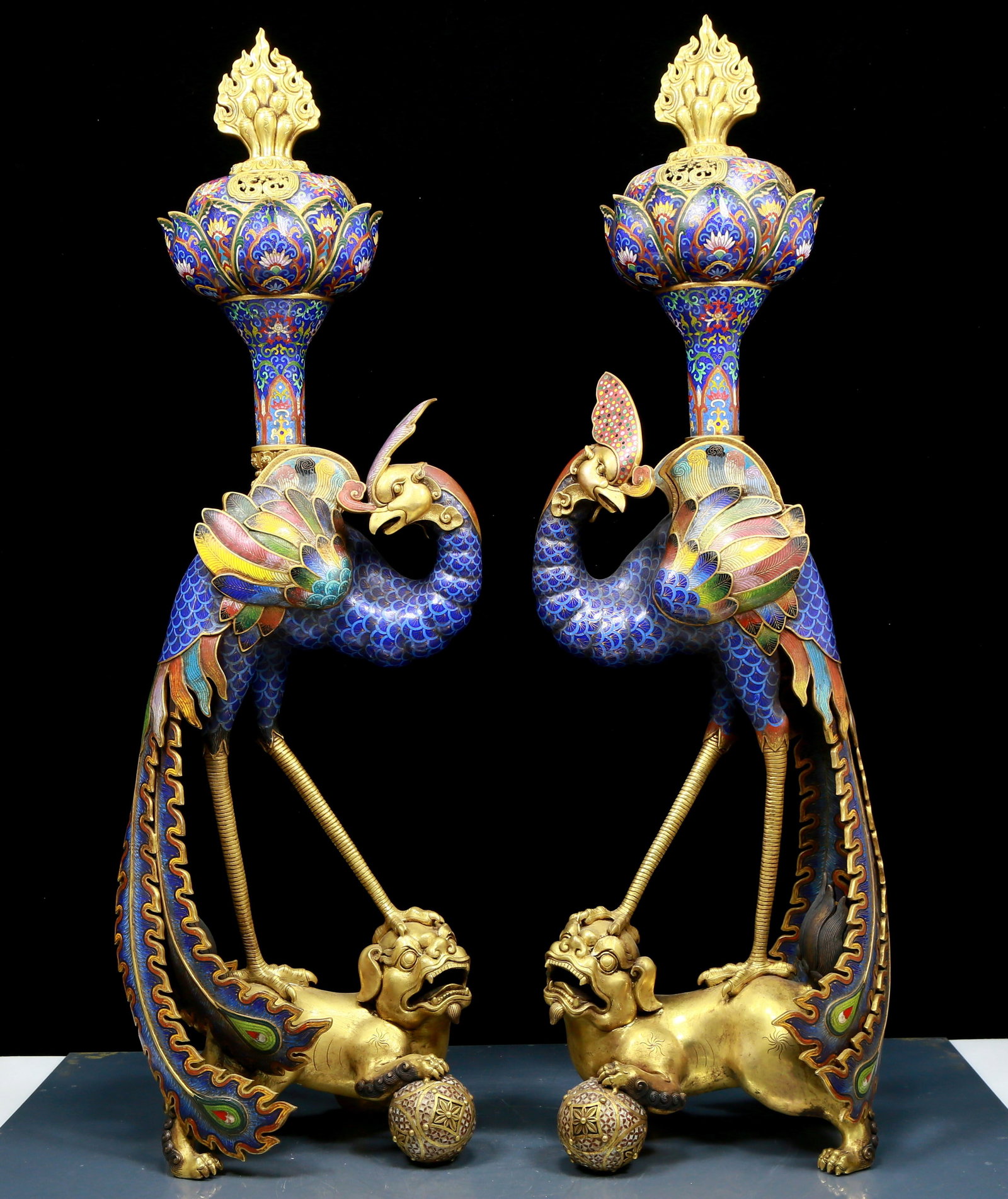 A magnificent pair of cloisonn?? phoenix censers: A pair of cloisonne phoenix censers, Qianlong four-character censer, Qing Dynasty, China. This pair of cloisonne phoenix censers, 42.1in high, is a pair of very exquisite art treasures. Phoenix symbol