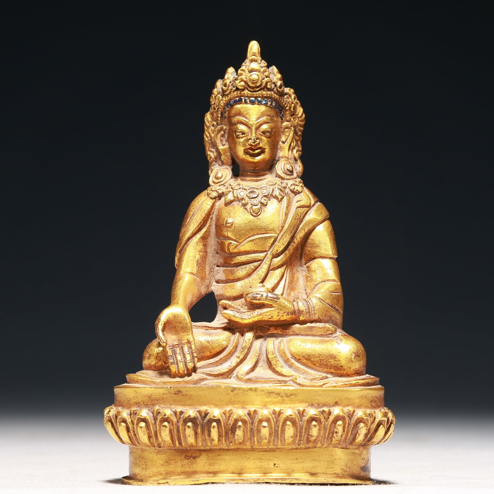 A Solemn Gilt Bronze Statue of Amitayus: A Solemn Gilt Bronze Statue of Amitayus,Qing Dynasty,China,Size:3inx2.2inx4.7in,Weight:350g 铜鎏金无量寿佛像,中国清代