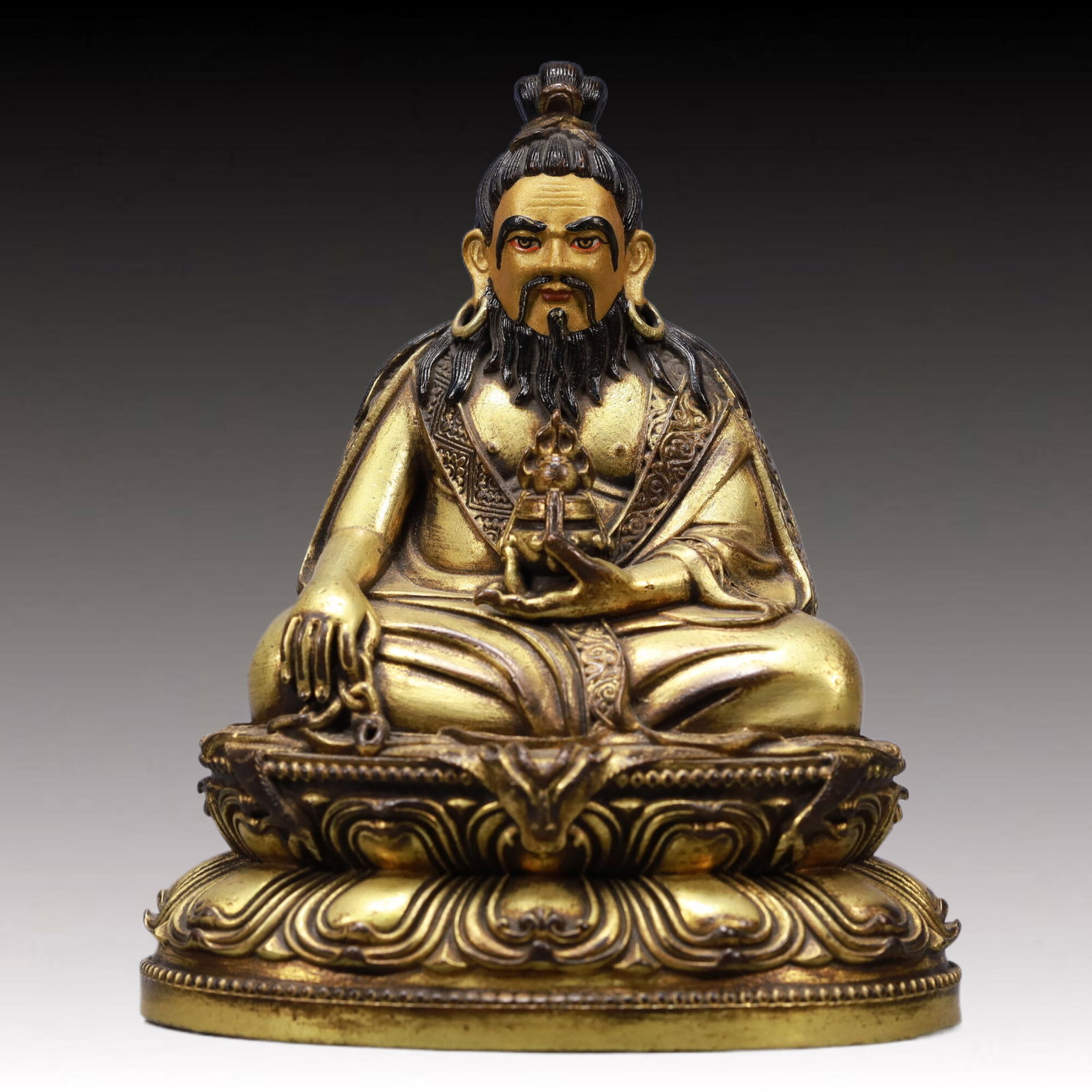 A Solemn Gilt Bronze Statue of Great Achiever: A Solemn Gilt Bronze Statue of Great Achiever,Ming Dynasty, China,Size:5.1inx3.7inx6.7inWeight:1000g 铜鎏金大成就着像,中国明代