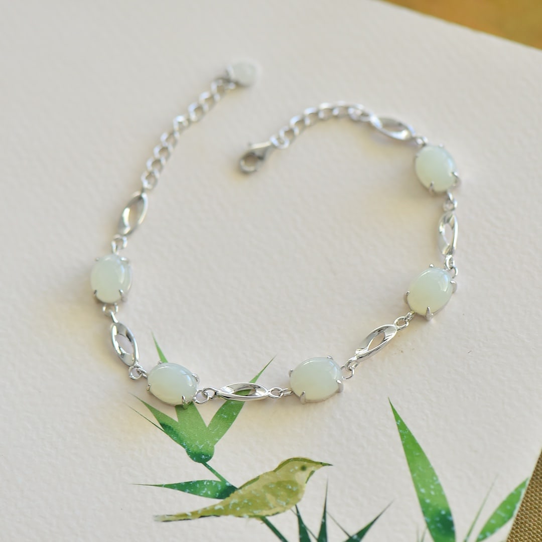 An Exquisite Sterling Silver Inlaid White Jade Bracelet: An Exquisite Sterling Silver Inlaid White Jade Bracelet, 纯银镶白玉手链