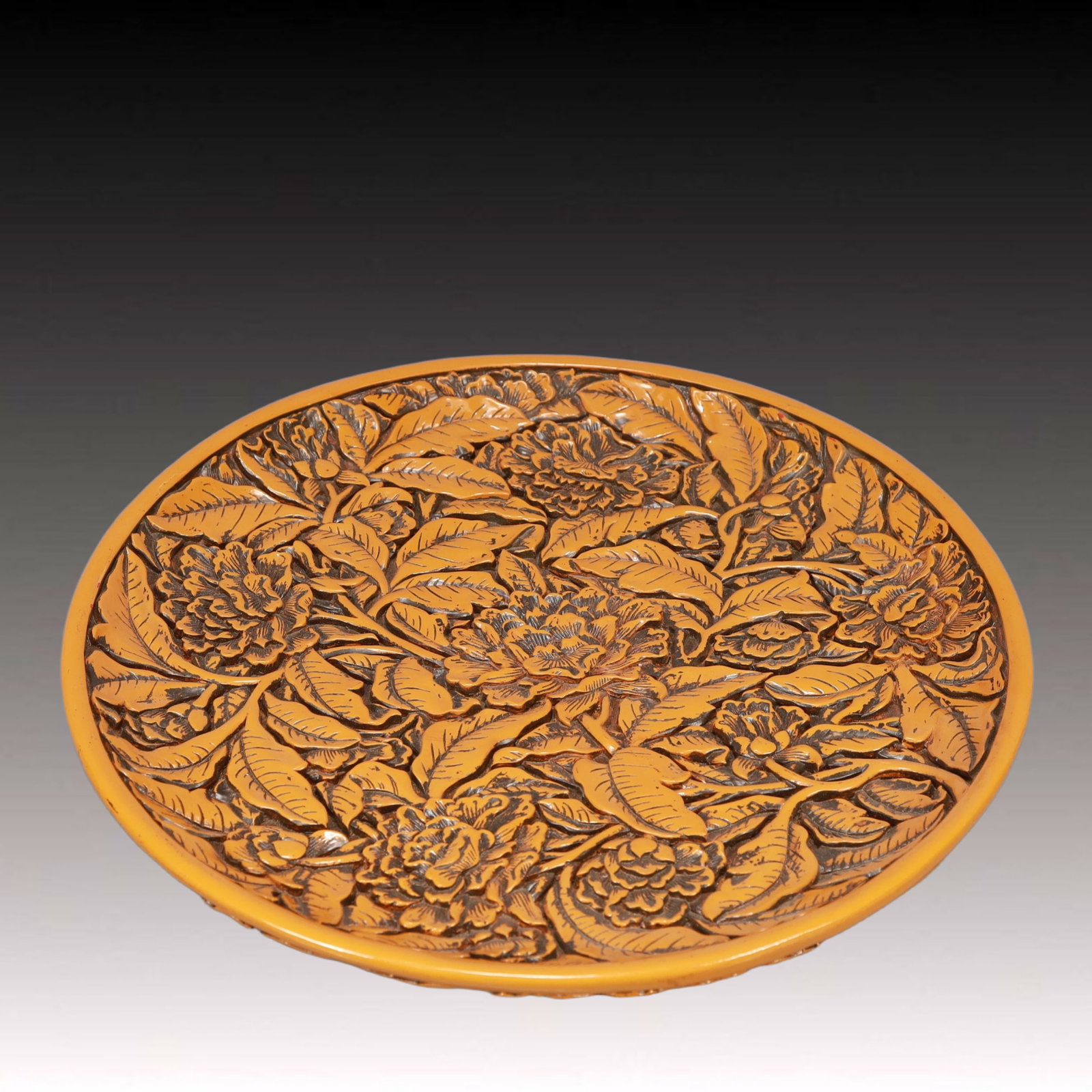A Rare Yellow Lacquer peony Pattern Plate: A Rare Yellow Lacquer peony Pattern Plate,Qing Dynasty, China,Qianlong Six-character Mark,Size:13.8inx1.2in,Weight:1800g