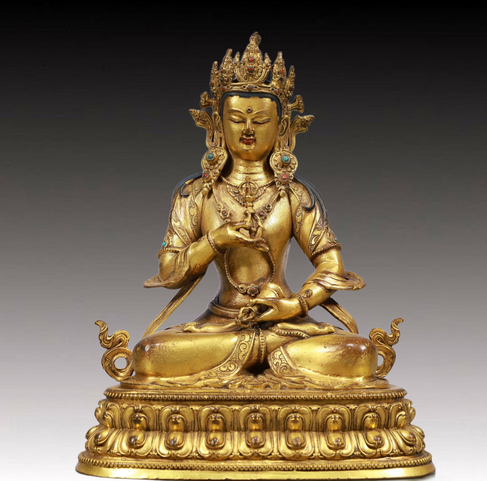 A Solemn Gilt Bronze Statue of Vajrasattva, Inlaid Gems: A Solemn Gilt Bronze Statue of Vajrasattva, Inlaid Gems, Qing Dynasty, China, Qianlong Mark, Size:7.1inx4.7inx9.8in, Weight:1700g 铜鎏金金刚萨陲像,î