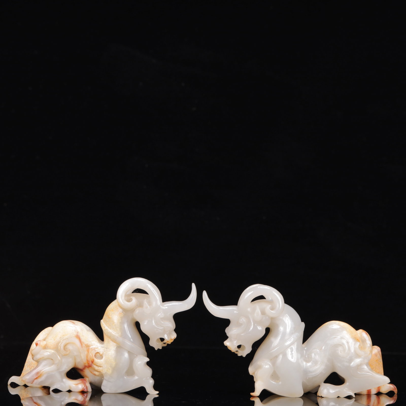 A Pair of Exquisite White Jade Auspicious Beast Ornaments (1 of 15)