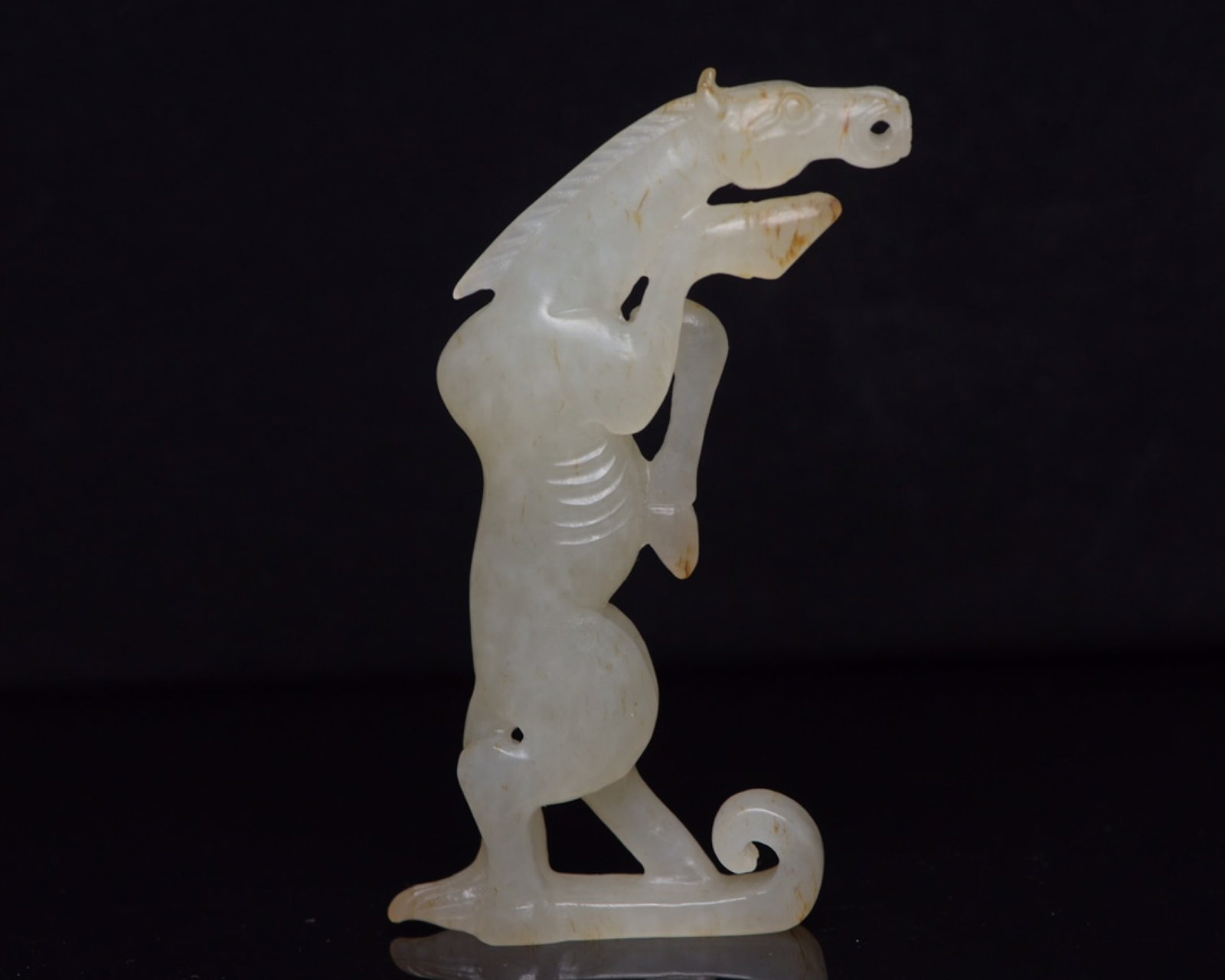 An Exquisite White Jade Horse Ornament: An Exquisite White Jade Horse Ornament,Qing Dynasty,China,Size:3.2inx1.6inx0.5in,Weight:40g 白玉骏马摆件,中国清代