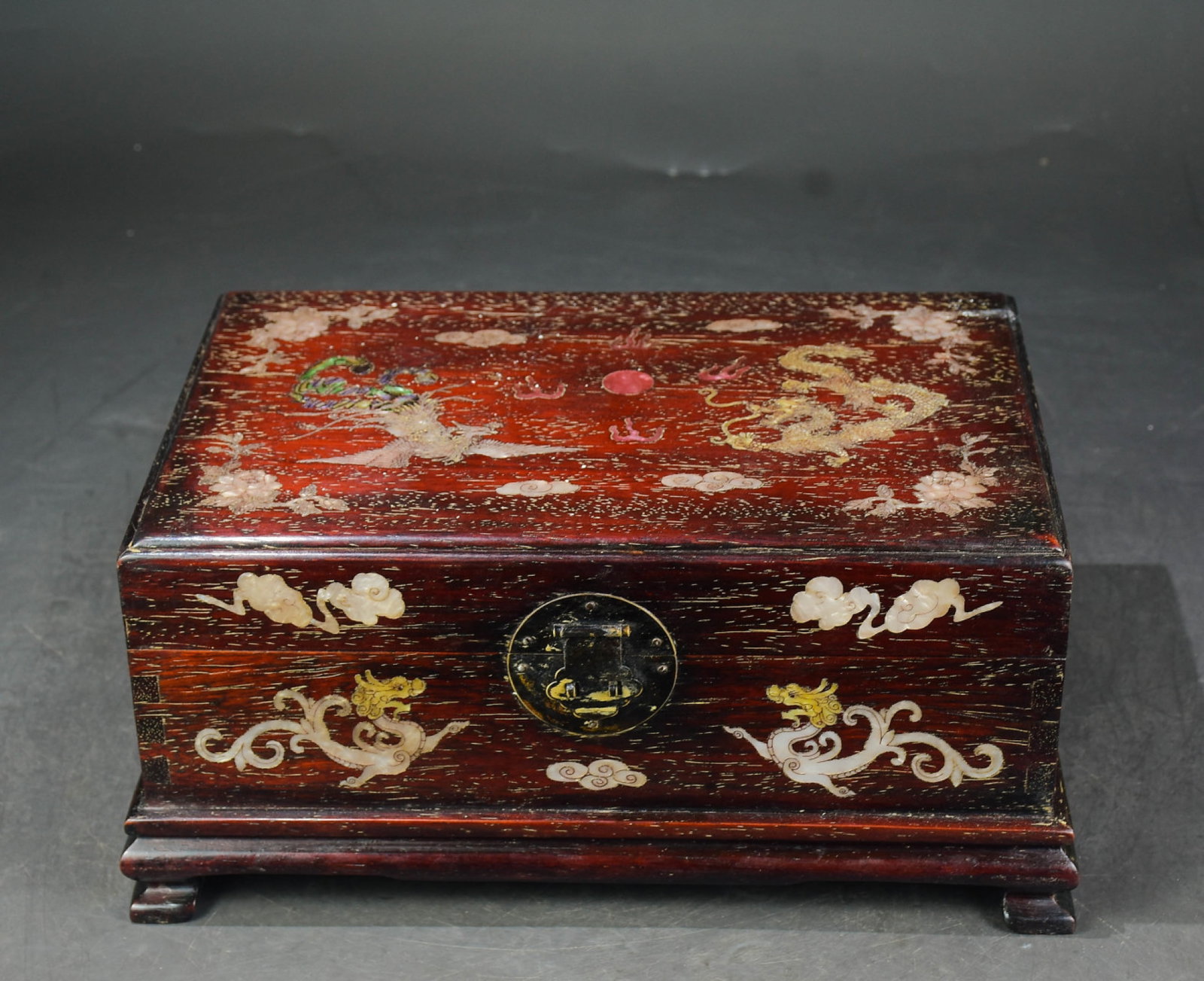 A Rare Zitanwood Inlaid Shell Dragon and Phoenix Pattern Box: A Rare Zitanwood Inlaid Shell Dragon and Phoenix Pattern Box,Qing Dynasty,China,Size:6.3inx13.8inx9.1in 紫檀木镶贝壳龙凤纹箱,中国