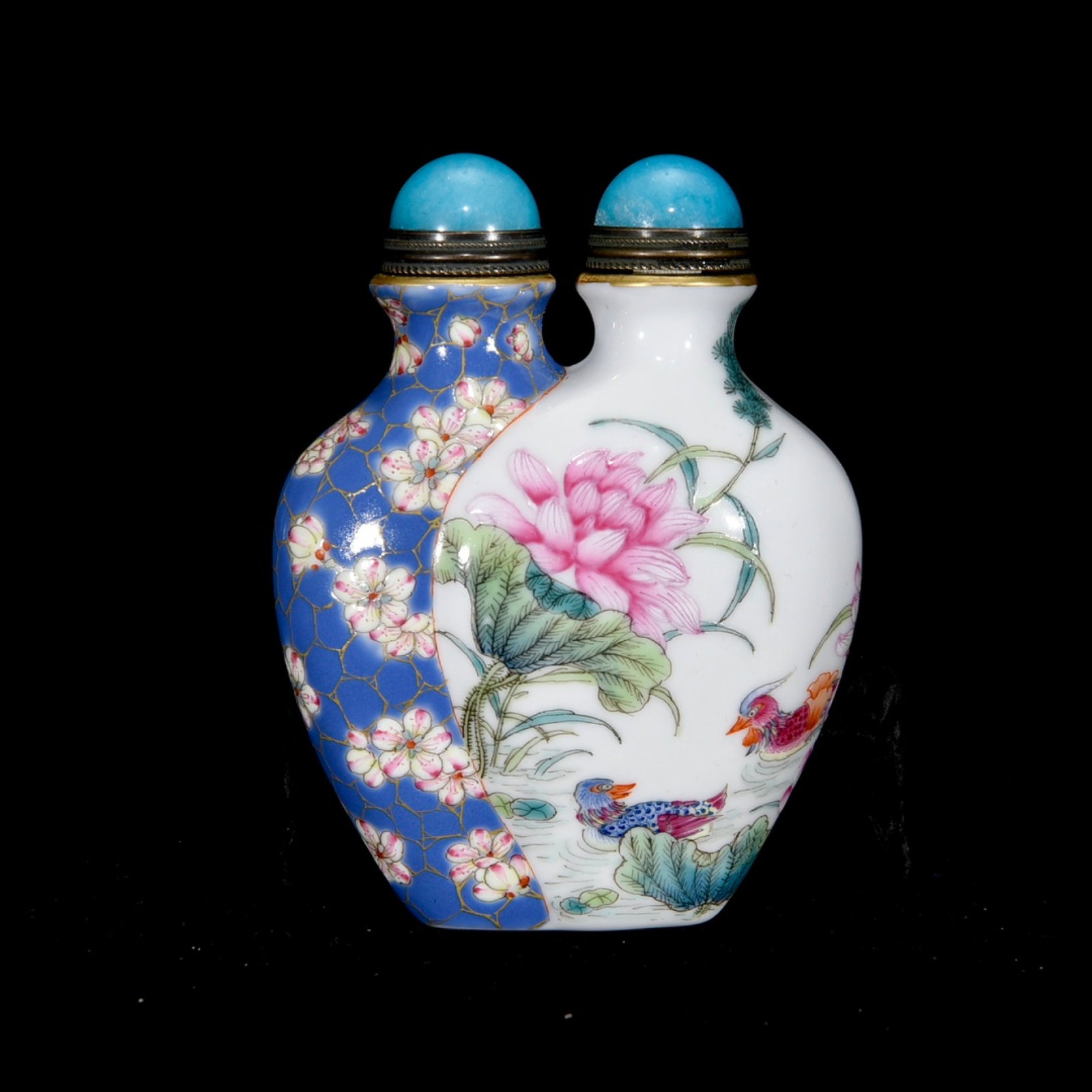 An Exquisite Enamel Flower and Mandarin Duck Pattern Snuff Bottle: An Exquisite Enamel Flower and Mandarin Duck Pattern Snuff Bottle,Qing Dynasty,China,Qianlong Six-Character Mark,Size:3.3inx2.6inx1.2in 珐琅彩花卉鸳鸯纹