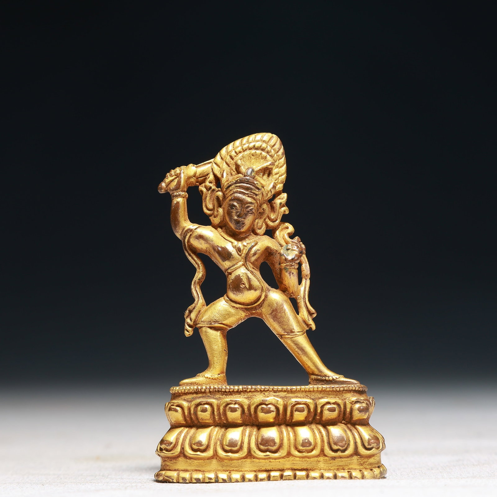 A Solemn Gilt Bronze Buddha Statue: A Solemn Gilt Bronze Buddha Statue,Qing Dynasty,China,Size:2inx0.8inx3in,Weight:100g 铜鎏金佛像,中国清代