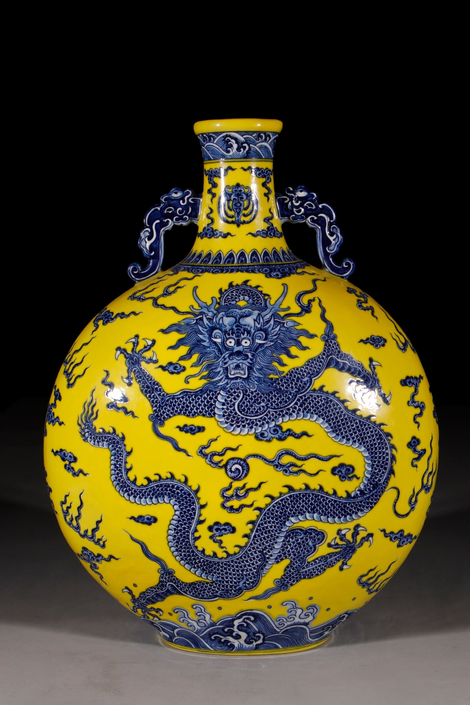 A Huge Yellow Ground Blue and White Seawater and Dragon Pattern Double-Ears Vase: A Huge Yellow Ground Blue and White Seawater and Dragon Pattern Double-Ears Vase,Qing Dynasty,China,Qianlong Six-character Mark,Size:17.2in