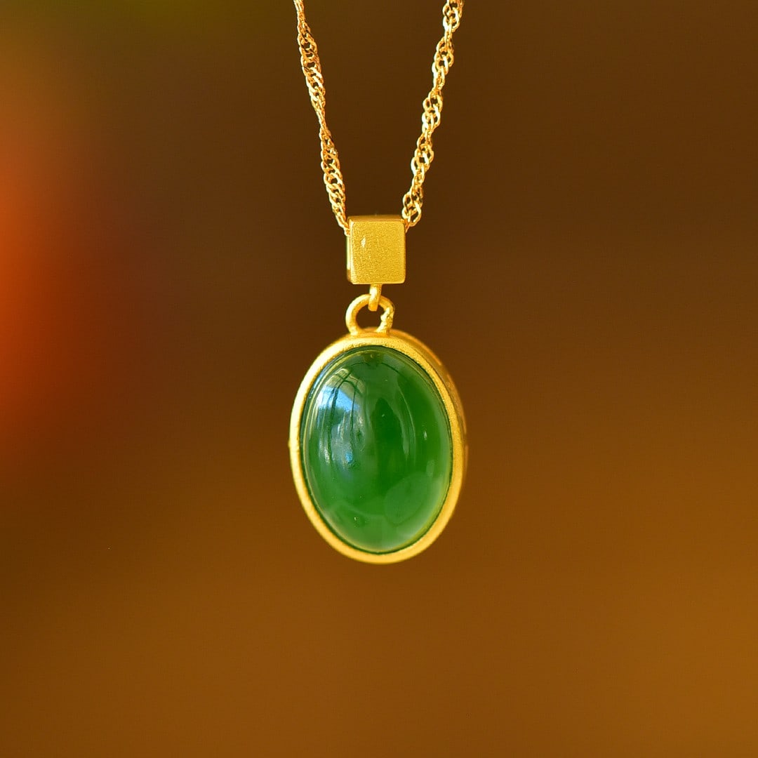 An Exquisite Sterling Silver-Gold Plated Inlaid Jasper Pendant: An Exquisite Sterling Silver-Gold Plated Inlaid Jasper Pendant,Size:0.4inx0.7in 纯银镀金镶碧玉吊坠