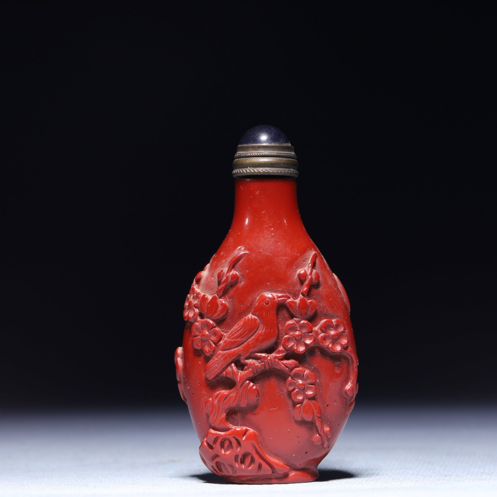 An Exquisite Carved Lacquer Flower and Bird Pattern Snuff Bottle: An Exquisite Carved Lacquer Flower and Bird Pattern Snuff Bottle,Qing Dynasty,China,Size:1.6inx0.8inx3in,Weight:46g