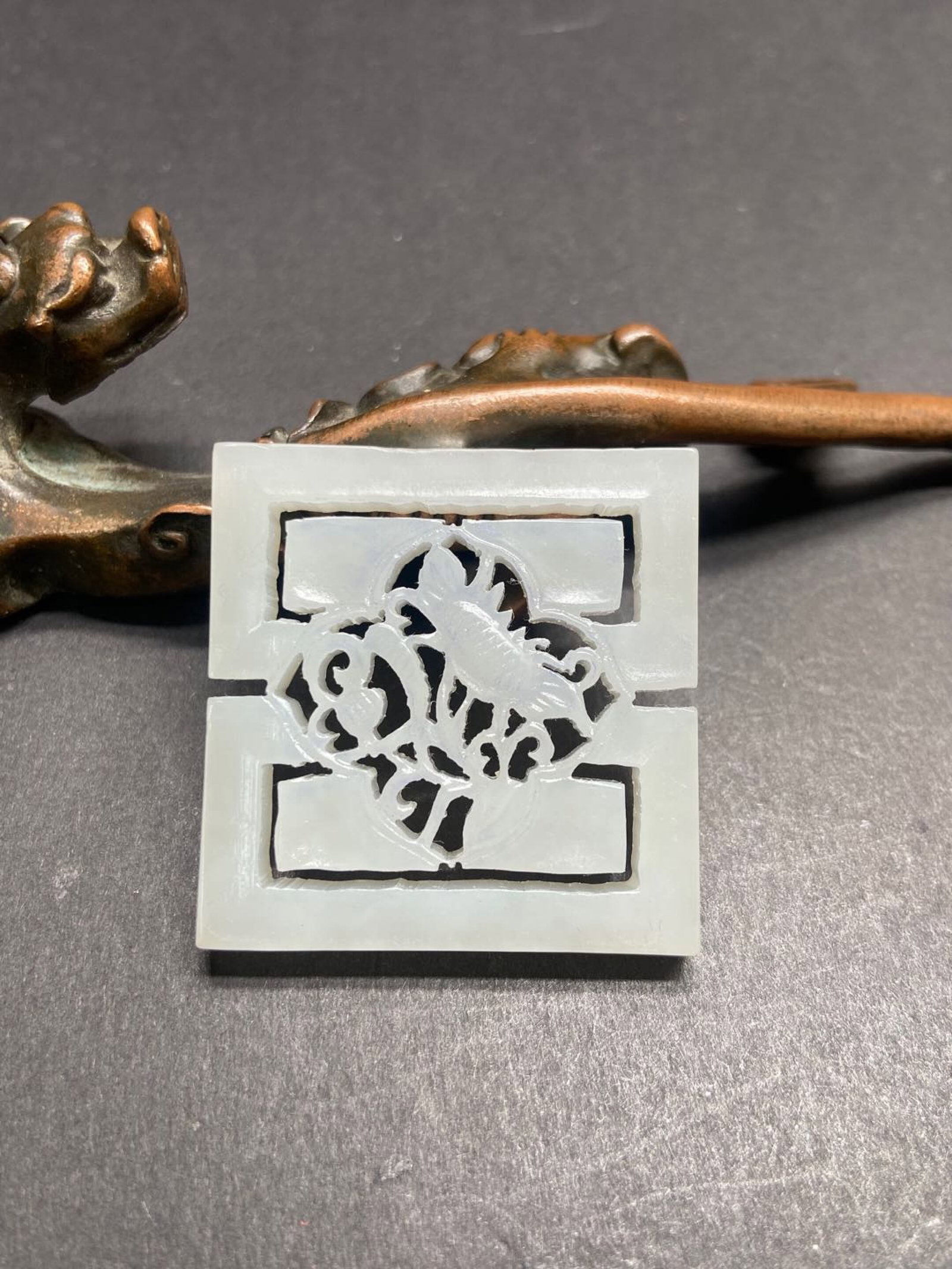 An Exquisite White Jade Hollow Pendant: An Exquisite White Jade Hollow Pendant,Qing Dynasty,China,Size:1.5inx1.5inx0.2in,Weight:17g 白玉镂空挂件,中国清代