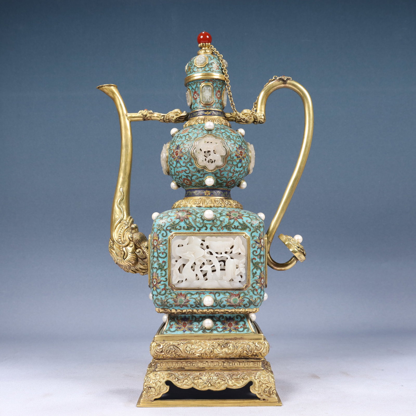 A Huge Cloisonne Inlaid White Jade Hollow Flower and Bird Pattern Ewer,Inlaid Pearls: A Huge Cloisonne Inlaid White Jade Hollow Flower and Bird Pattern Ewer,Inlaid Pearls,Qing Dynasty, China,Qianlong Four-character Mark,Size:10.6inx6.3inx17.7in,Weight:3800g 景泰蓝