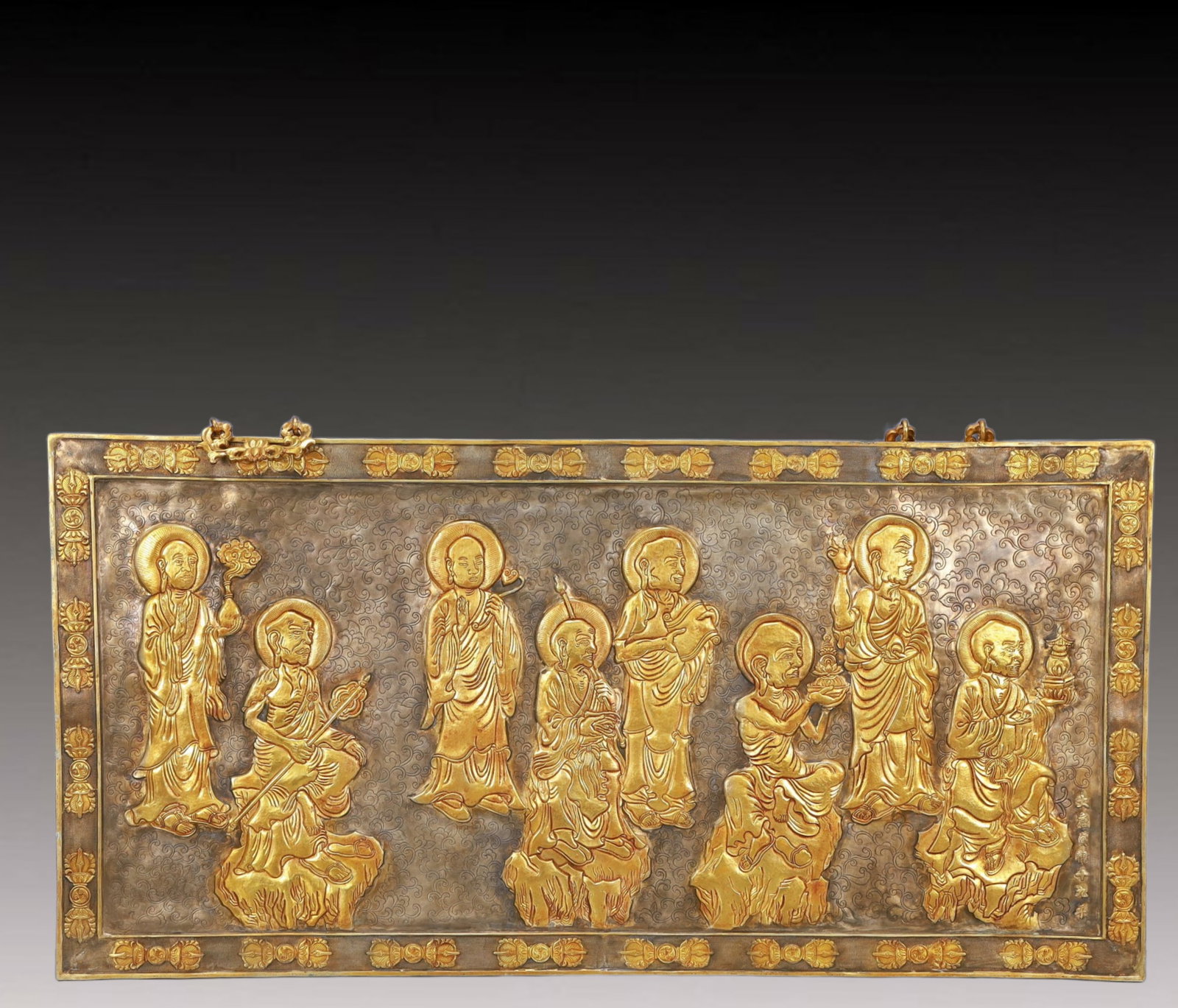 A Rare Gilt Silver Arhat Pattern Hanging Panel,With Scriptures: A Rare Gilt Silver Arhat Pattern Hanging Panel,With Scriptures,Tang Dynasty, China,Zhenguan Mark,Size:30.1inx15.2in,Weight:7200g 银鎏金罗汉纹挂屏,४