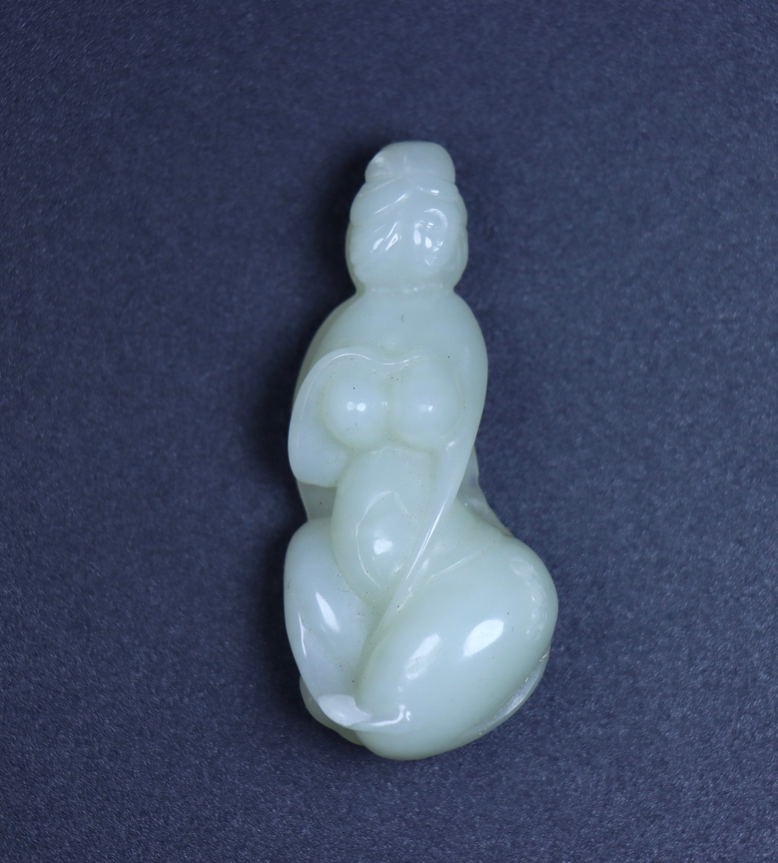 An Exquisite White Jade Figure Ornament: An Exquisite White Jade Figure Ornament,Qing Dynasty,China,Size:2.2inx1inx0.8in,Weight:24g 白玉人物摆件,中国清代