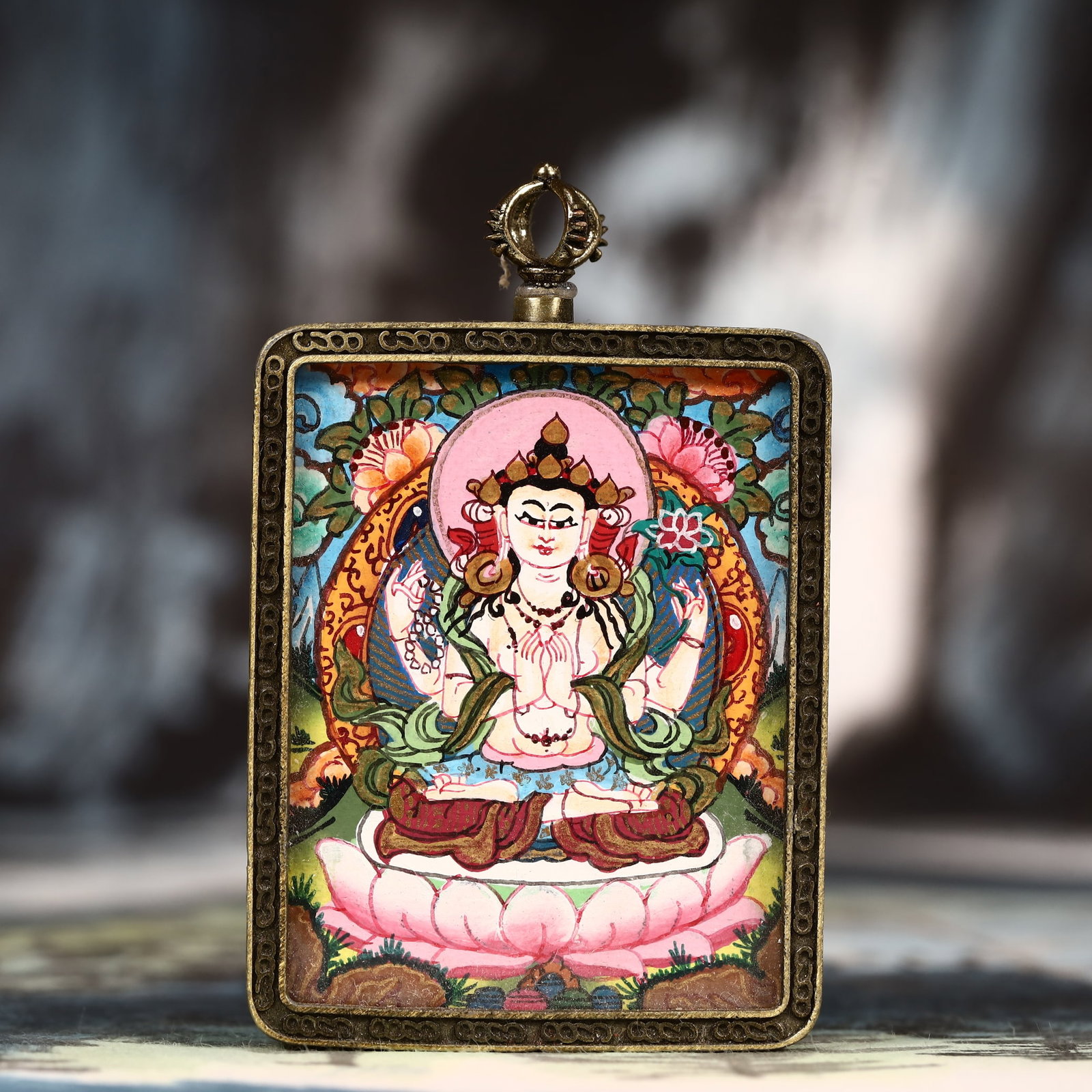 An Exquisite Painted Color Statue of Four-Armed Guanyin Tangka: An Exquisite Painted Color Statue of Four-Armed Guanyin Tangka,Size:2inx2.8in 彩绘四臂观音像唐卡
