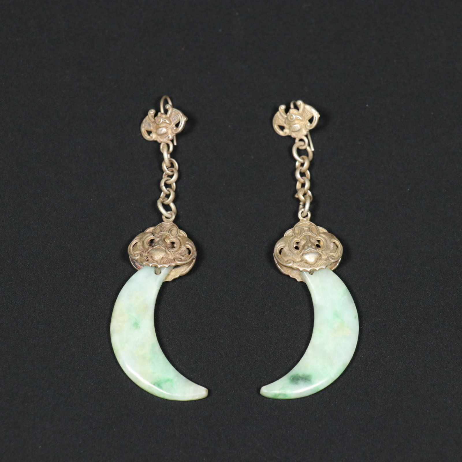 A Pair of Exquisite Jadeite Earrings: A Pair of Exquisite Jadeite Earrings,Qing Dynasty,China,Size:3.3inx0.7inx0.4in,Weight:18.9g 一对翡翠耳环,中国清代