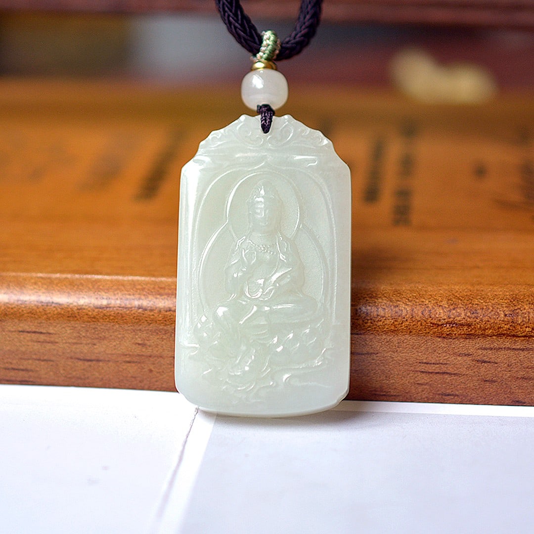 An Exquisite White Jade Statue of Avalokitesvara Pendant: An Exquisite White Jade Statue of Avalokitesvara Pendant,Size:1.1inx2in 白玉观音像挂件